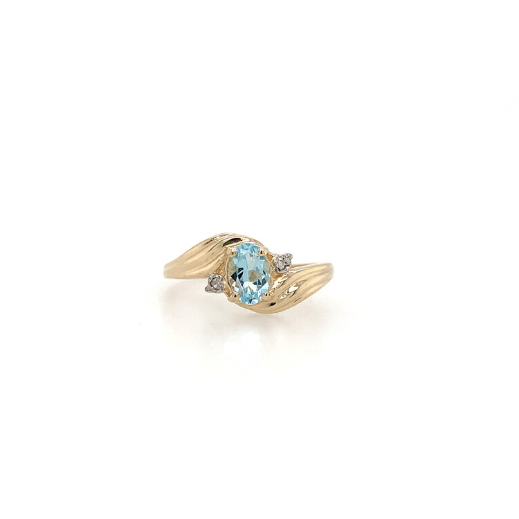 40344 14K YELLOW GOLD OVAL BLUE TOPAZ DIAMOND ON THE SIDES WAVED DESIGN RING