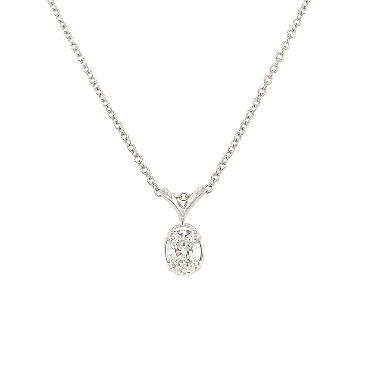 70472 14K WHITE GOLD .50CT  H VS1 OVAL DIAMOND SOLITAIRE WITH RABBIT EAR SETTING