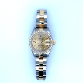 10051 TWO TONE ROLEX .70CT DIAMOND BEZEL AND .17CT ON GOLD DIAL 26MM LADY-DATEJUST 26MM WATCH