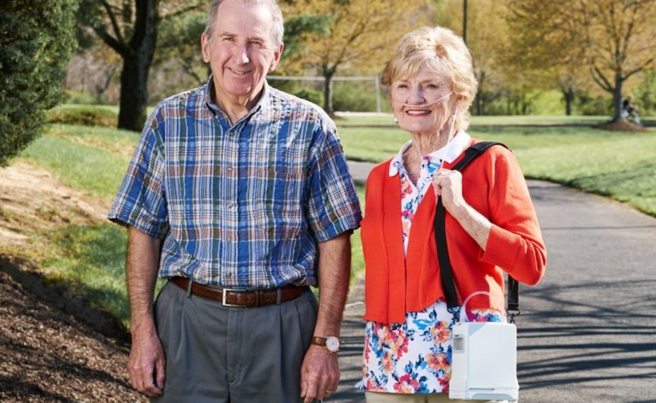 Couple takes a stroll while visiting Northern Arizona because they were able to rent a portable oxygen concentrator during their visit. 