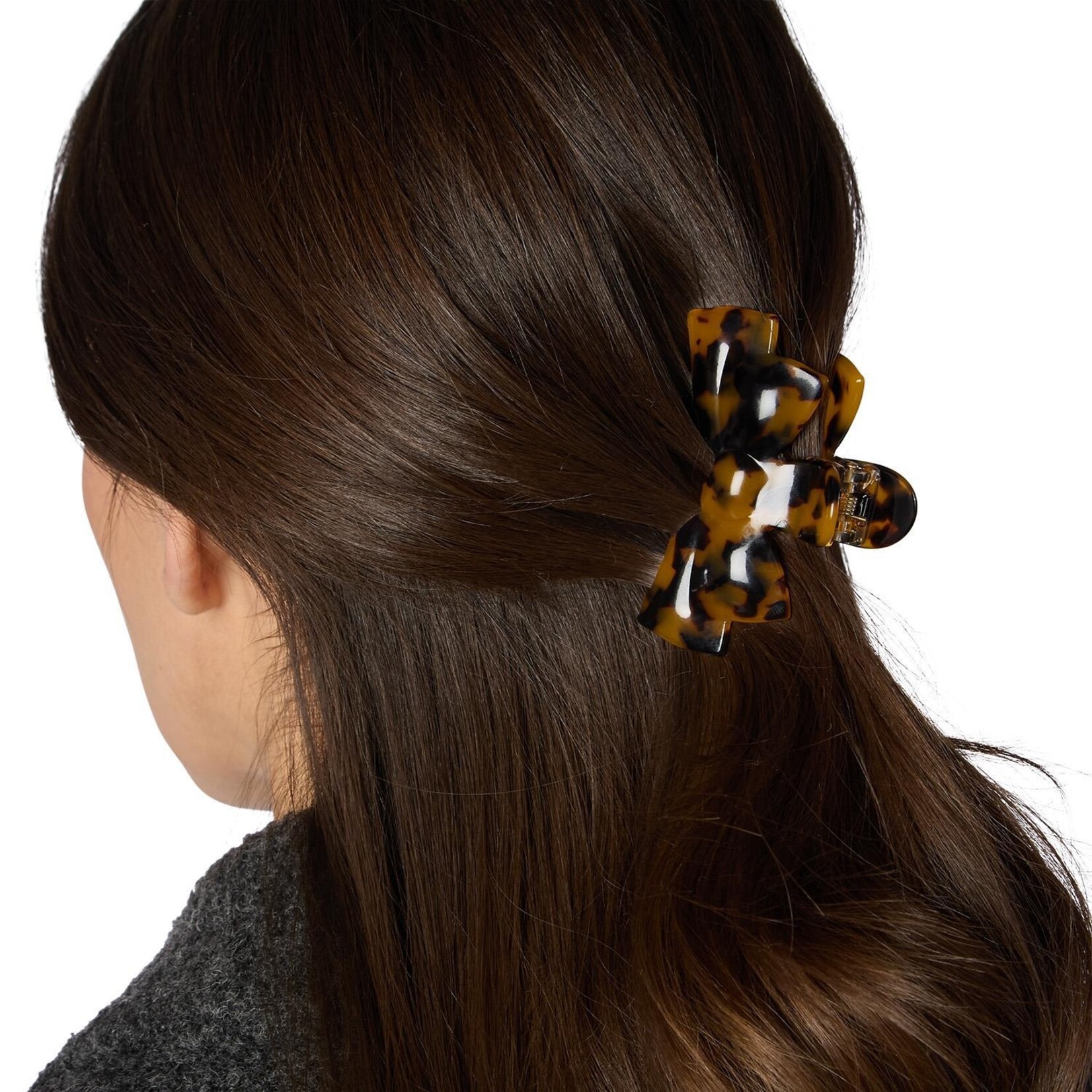 Two's Company Tortoise Twist Claw Clip in a Bow Shape