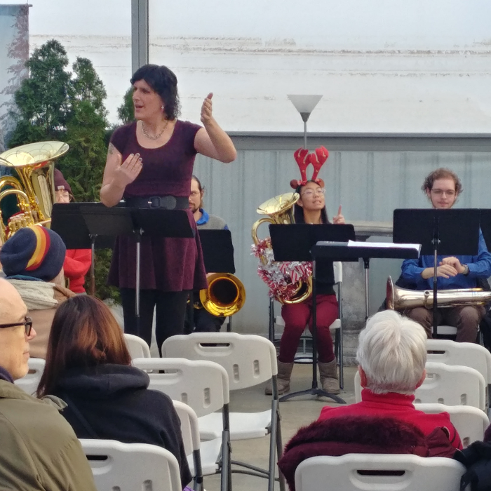 Low brass musicians performing holiday music