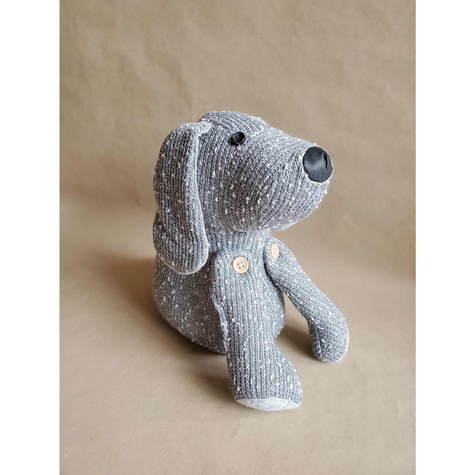 grey dog doorstop