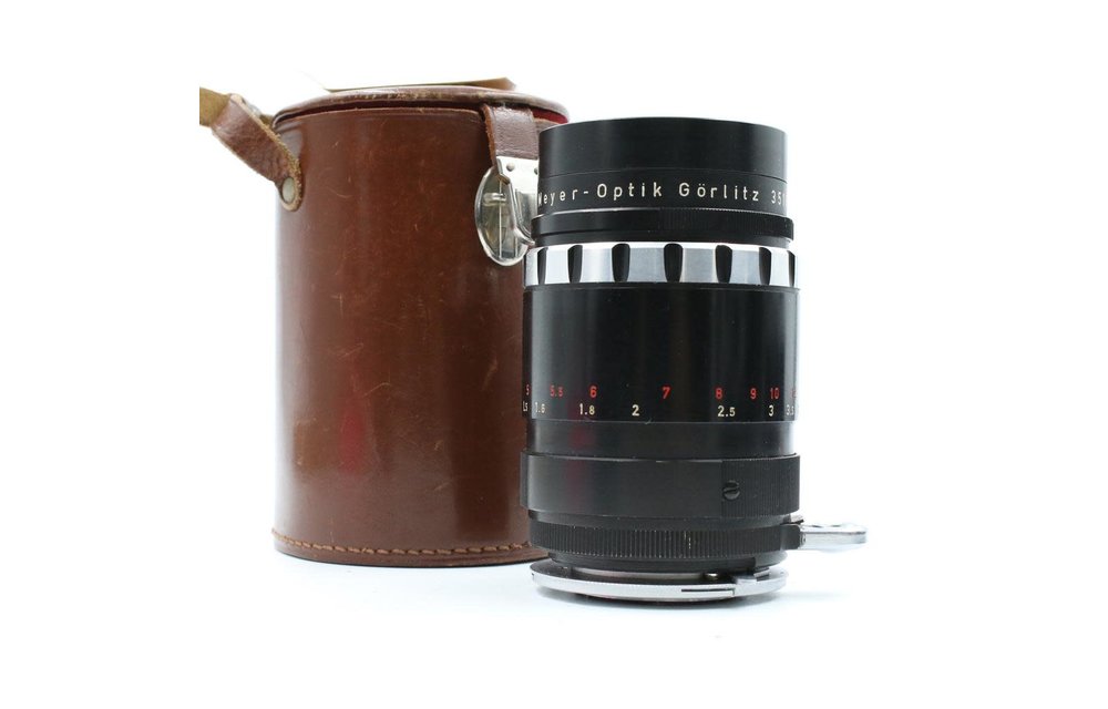 Preowned Meyer Görlitz Trioplan 100mm f/2.8 in Exakta mount with Canon FD Apapter