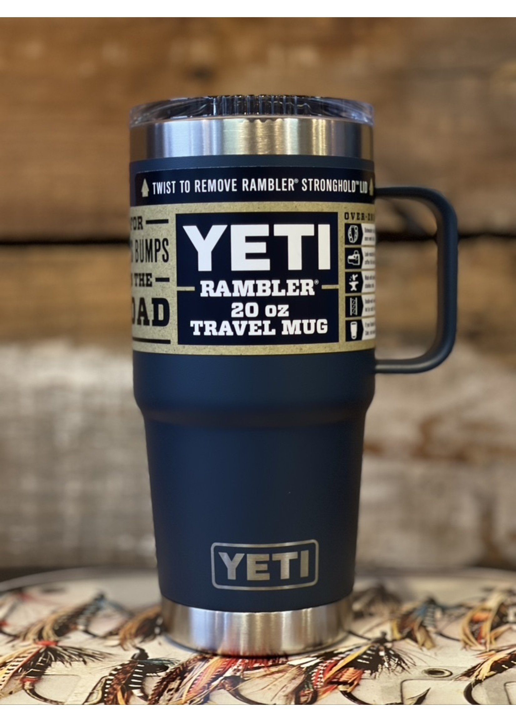 https://cdn.shoplightspeed.com/shops/644480/files/45667614/1652x2313x2/yeti-rambler-20-oz-travel-mug-navy.jpg