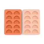 here's how The Dotty Citrus Wedge Ice Trays - Orange + Blush Pink