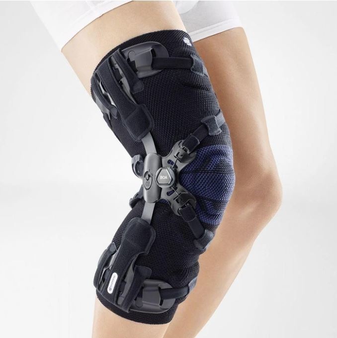 Genutrain Comfort - Compression knee brace with plastic stays for