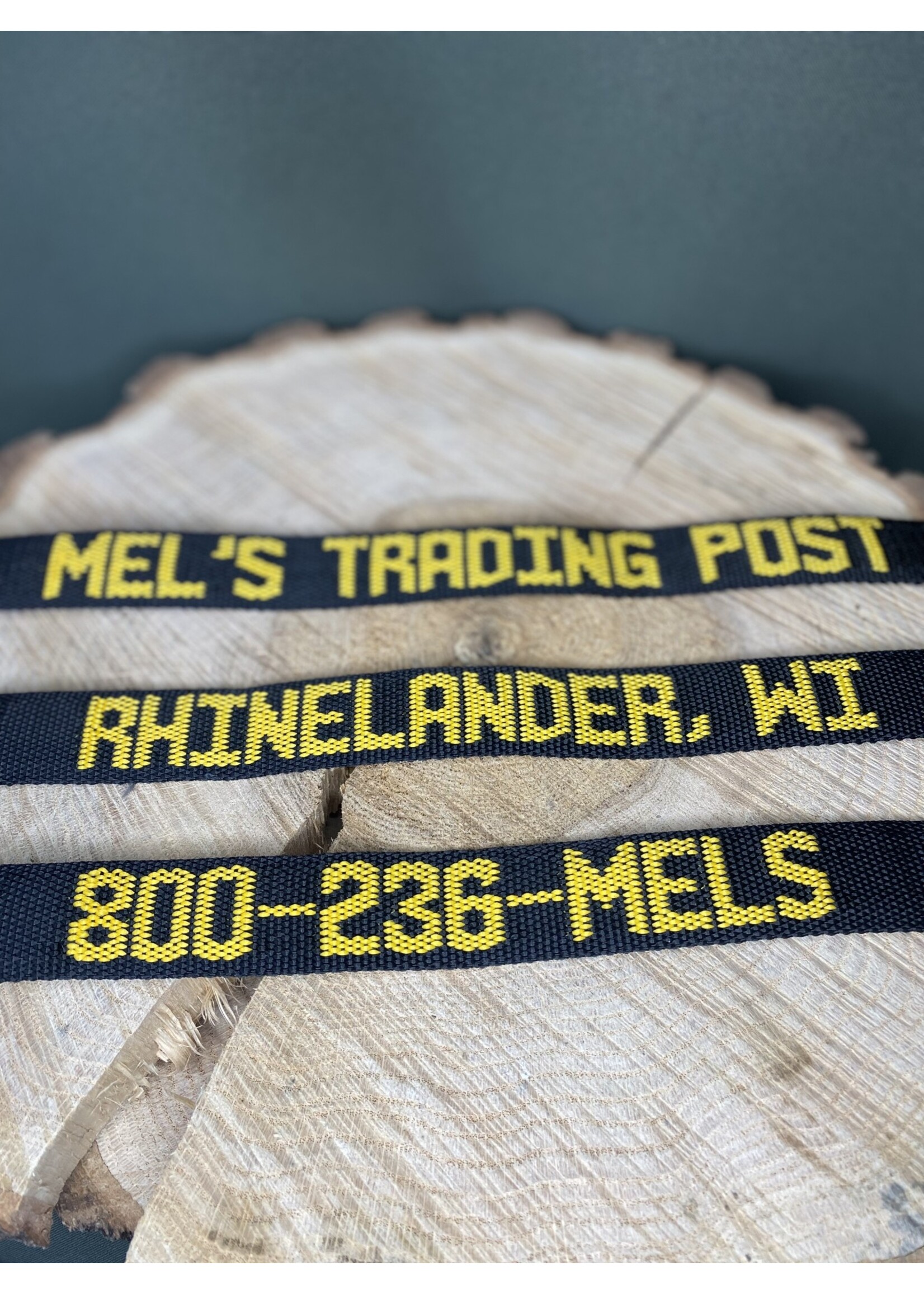 Mel's! Mel's Trading Post Tie Down