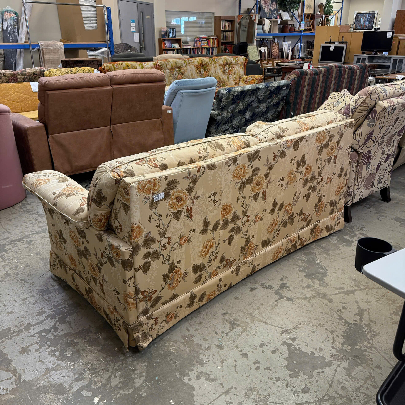 Beige Floral Pull Out Couch