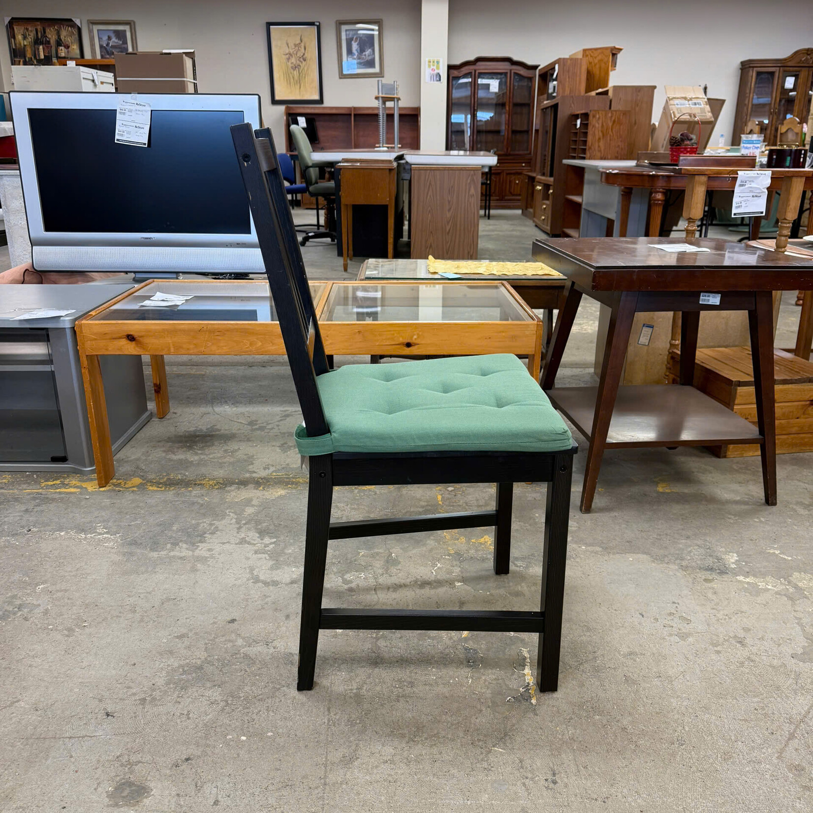 Black Chair Green Cushion