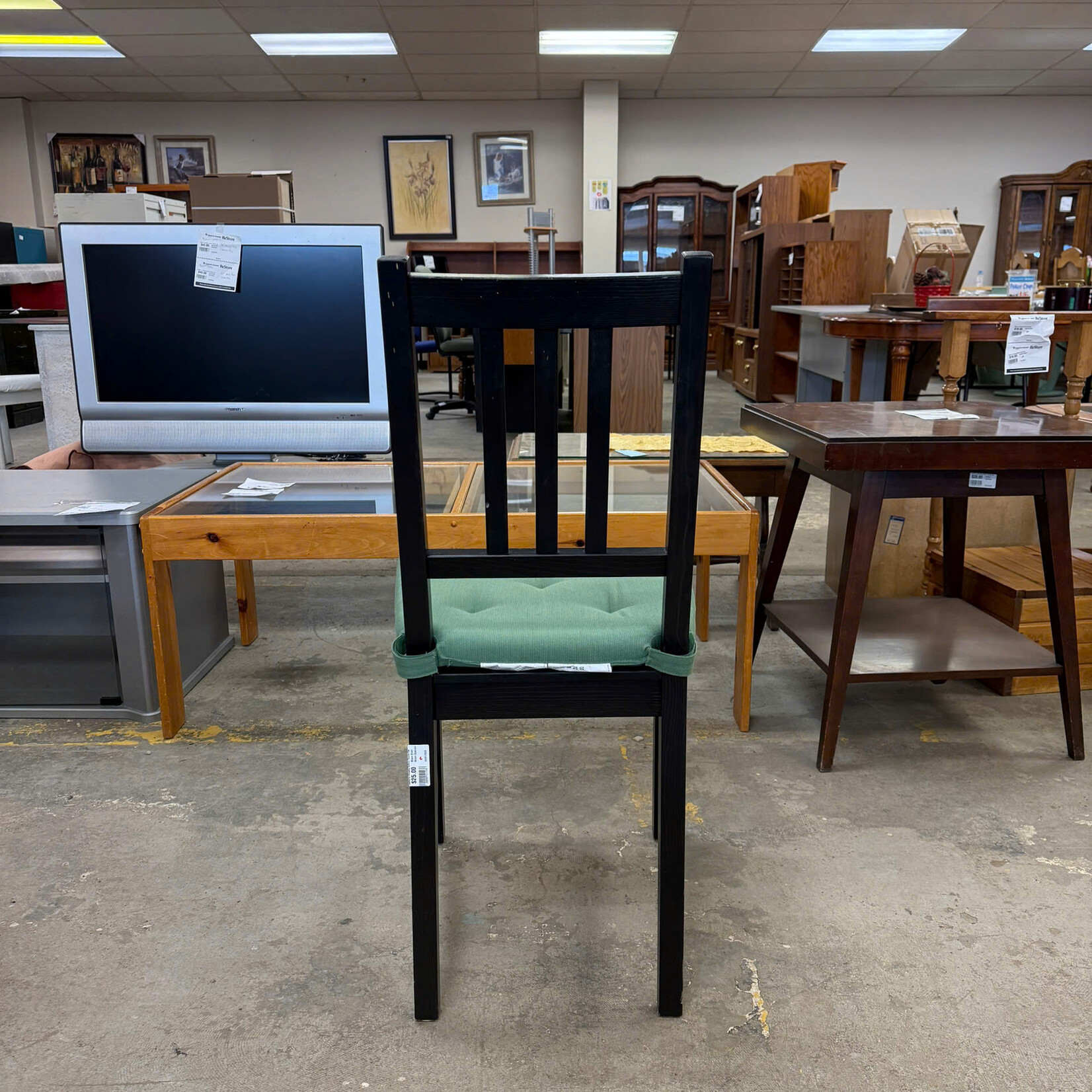 Black Chair Green Cushion