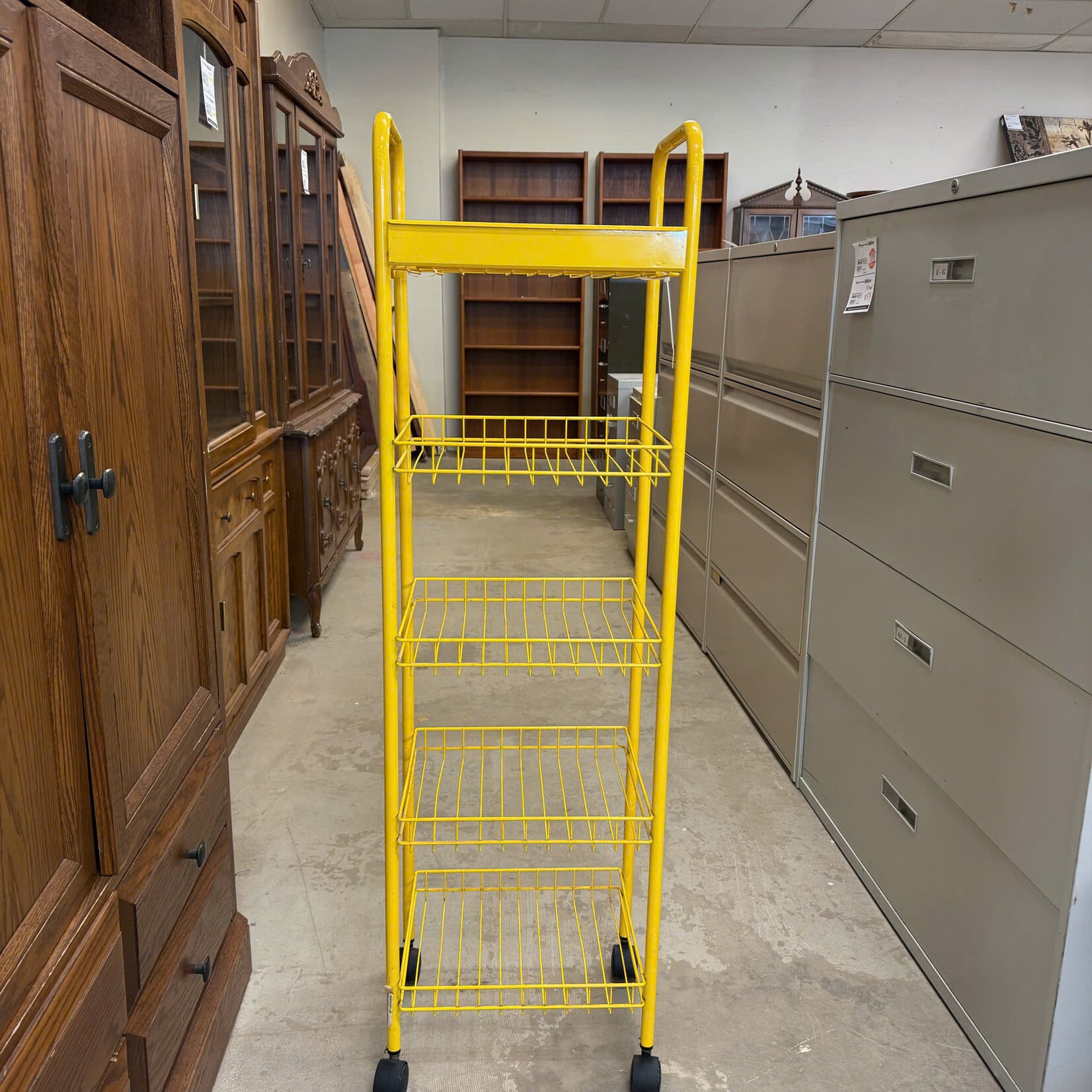 Yellow Metal Rolling Rack