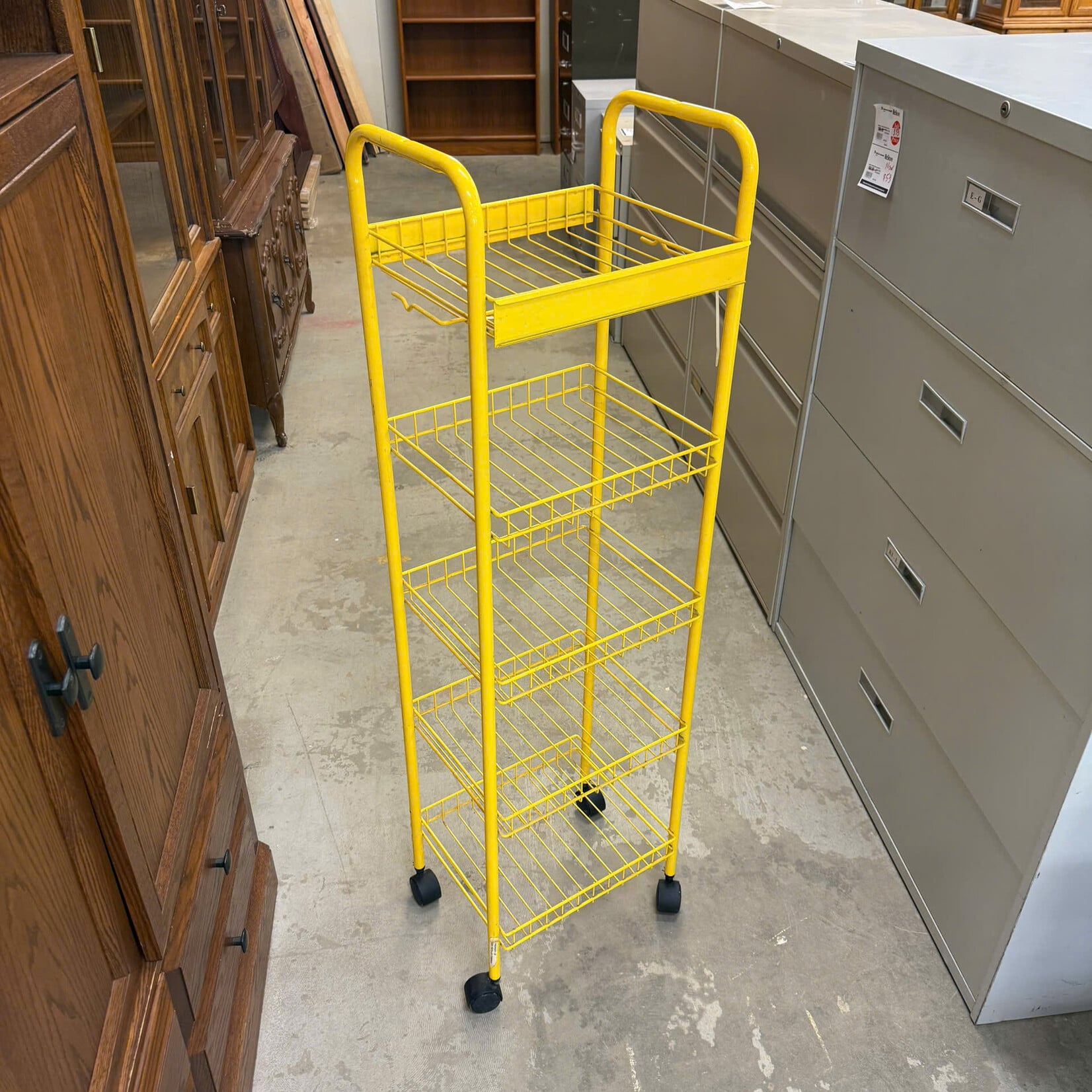 Yellow Metal Rolling Rack