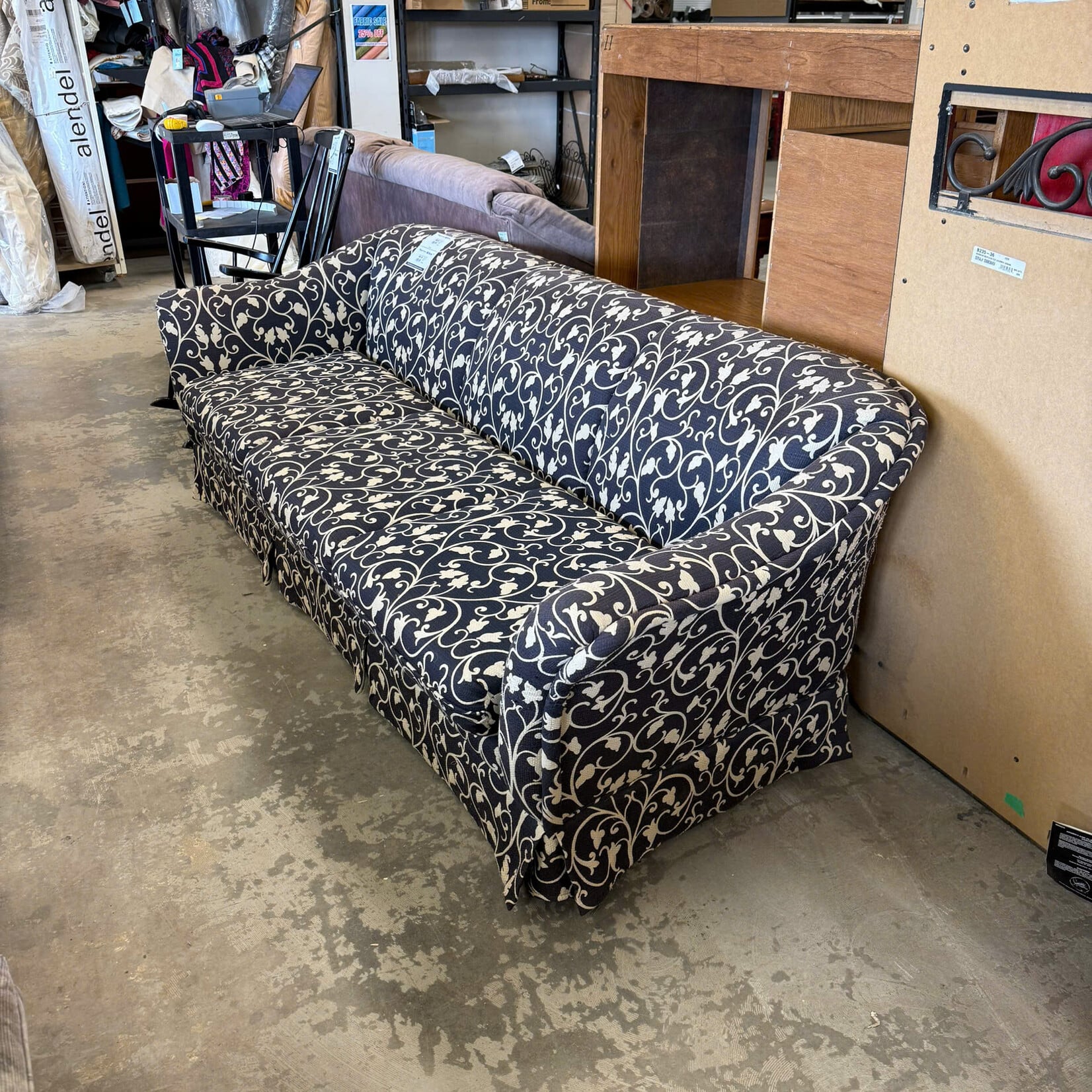 Blue Couch With Floral Pattern