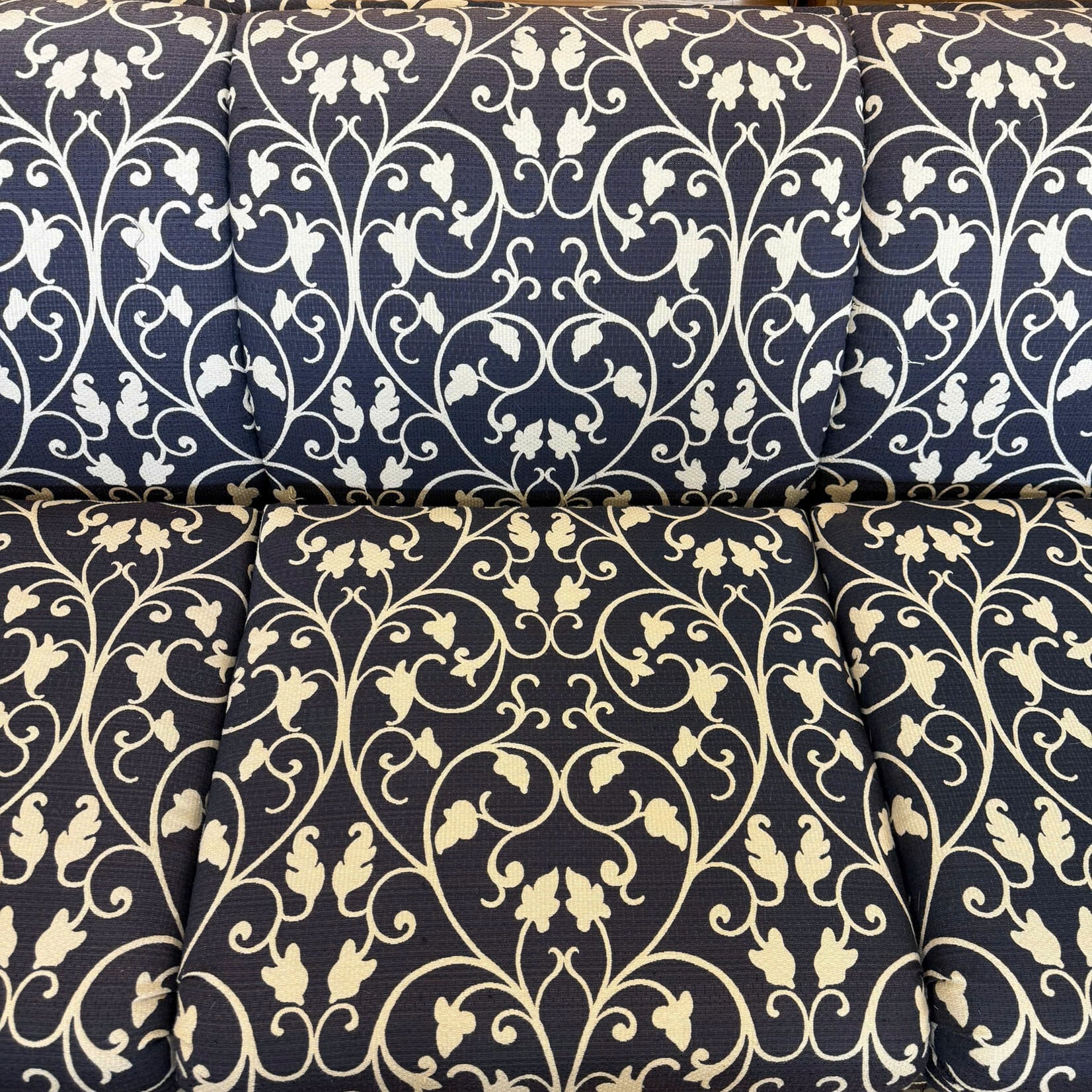 Blue Couch With Floral Pattern
