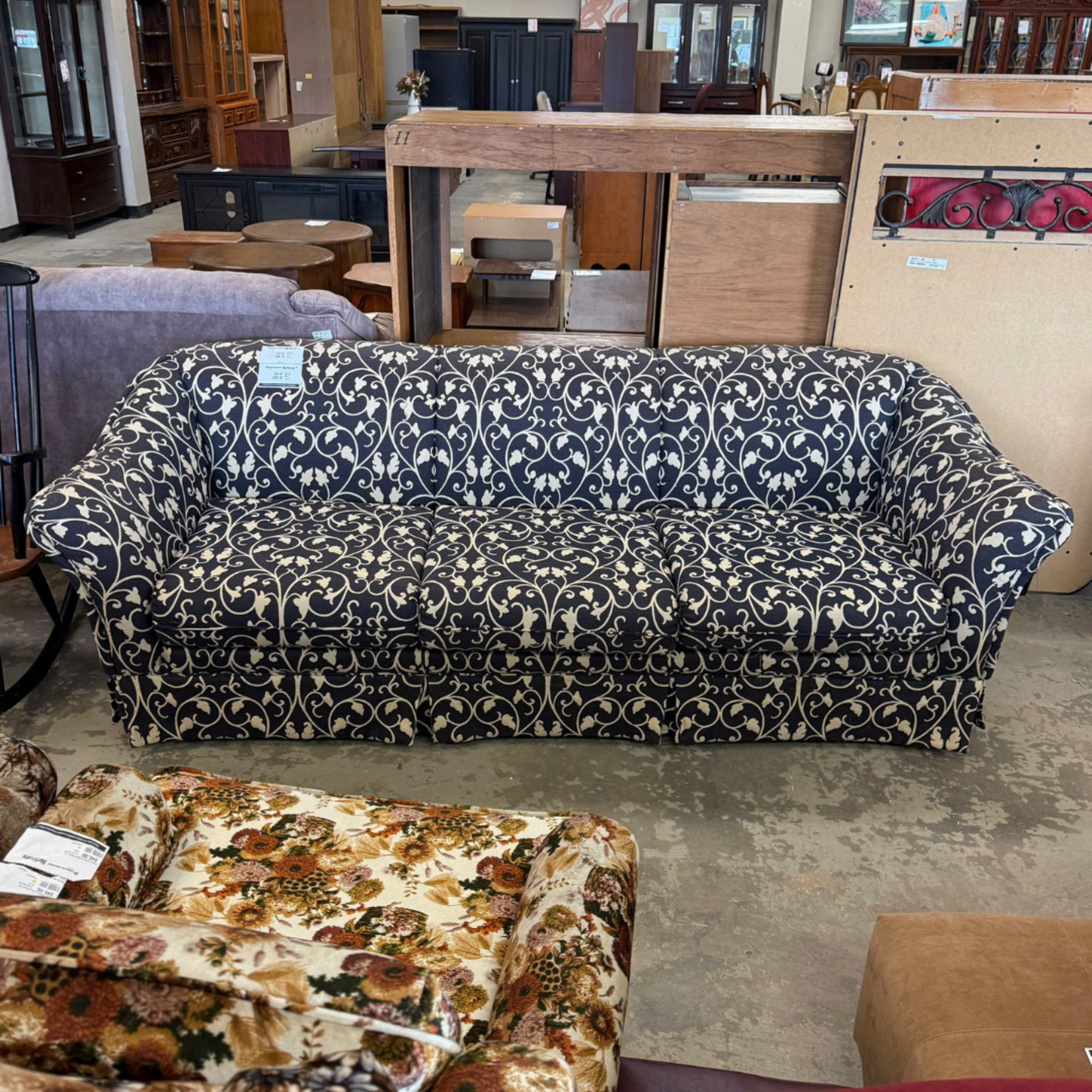 Blue Couch With Floral Pattern