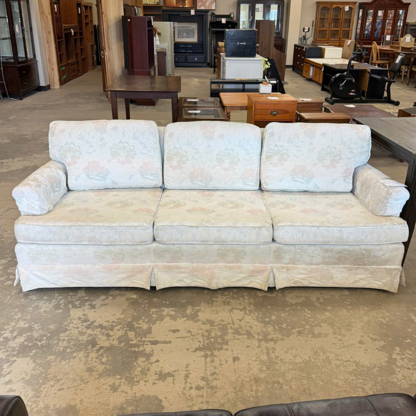 White Couch with Flower Design