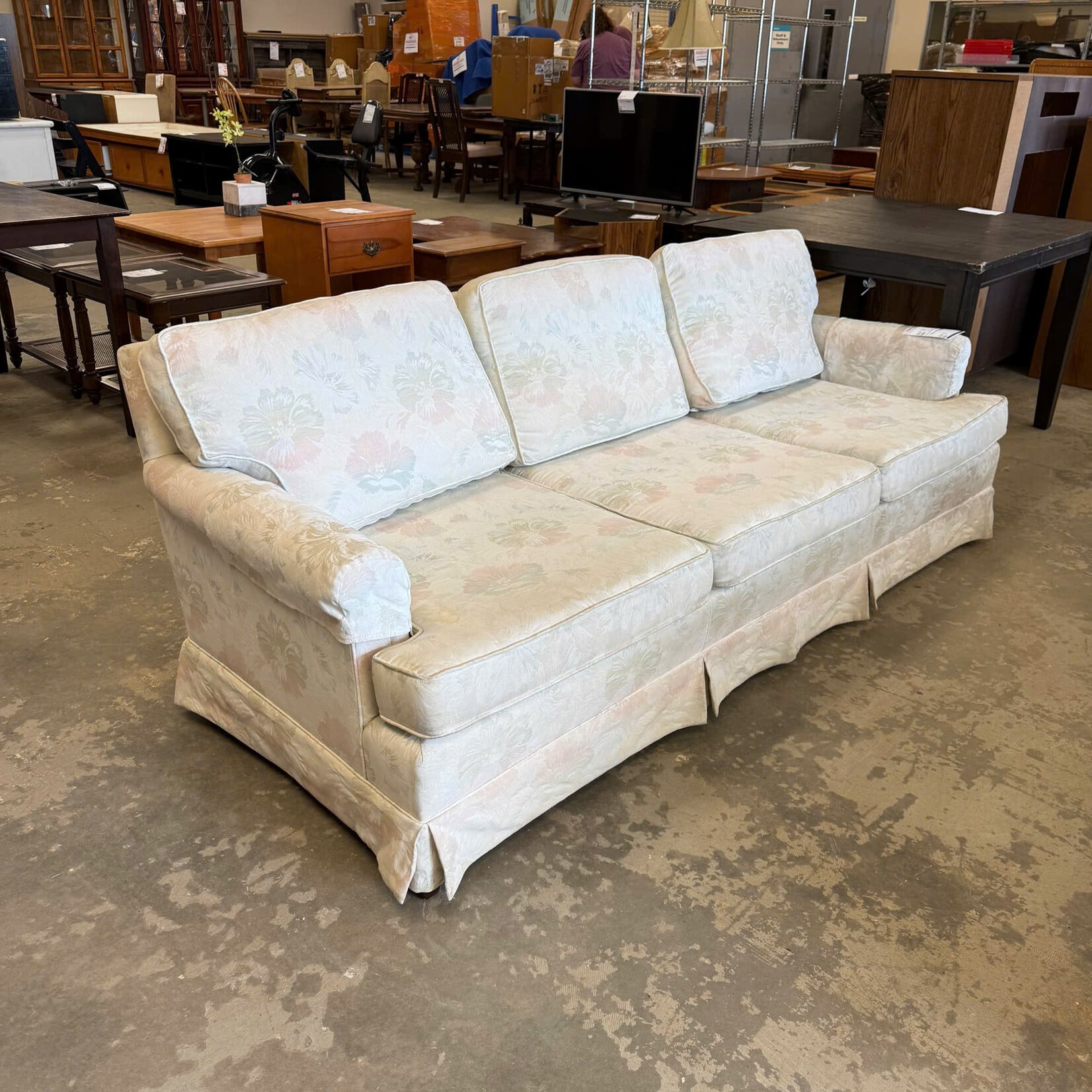 White Couch with Flower Design