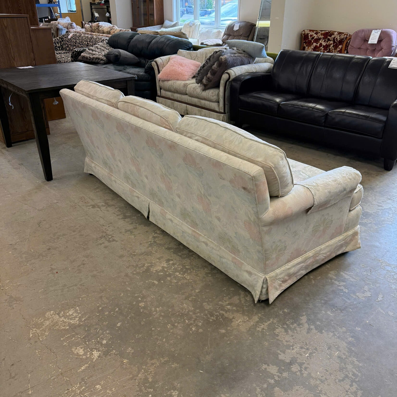 White Couch with Flower Design