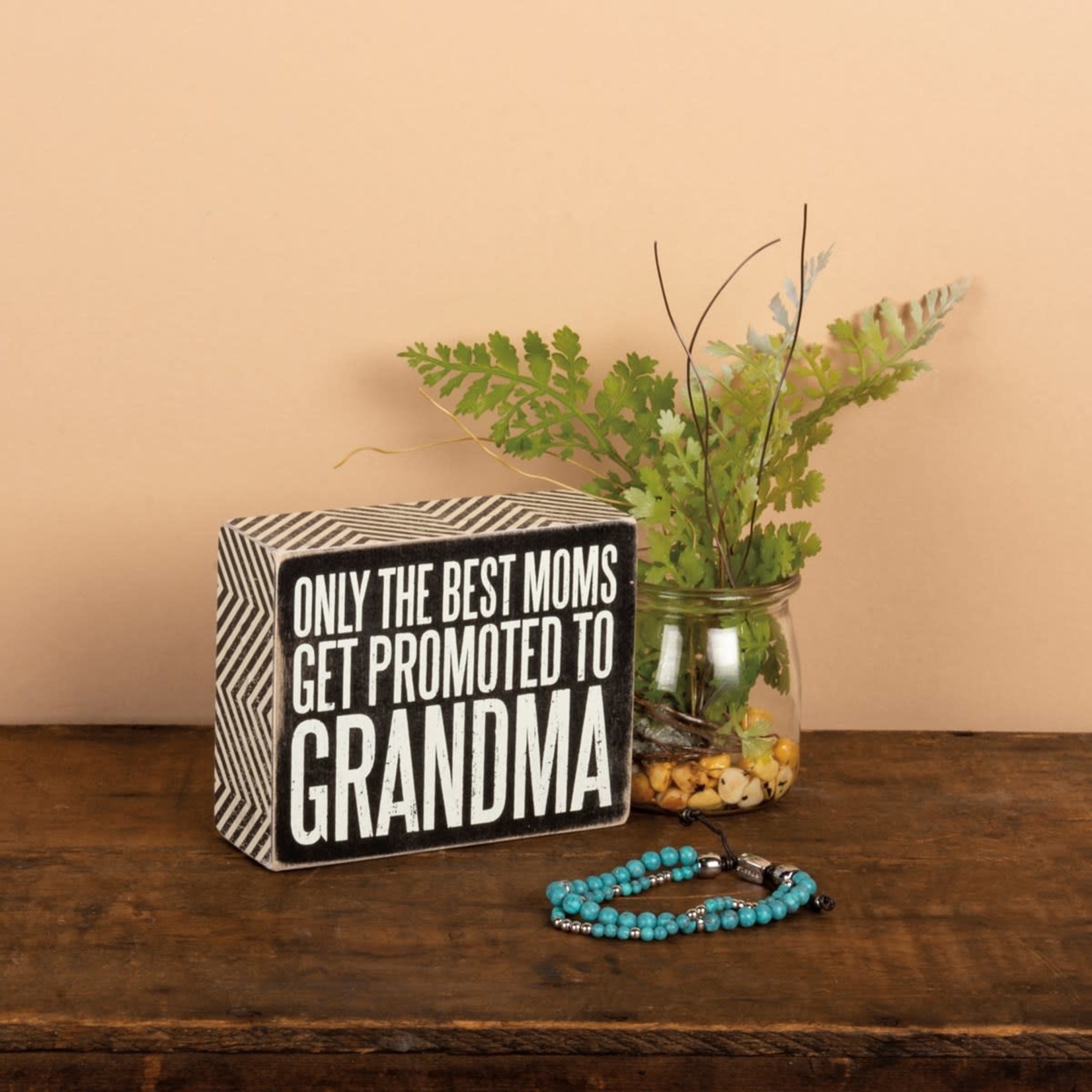 BOX SIGN PROMOTED TO GRANDMA