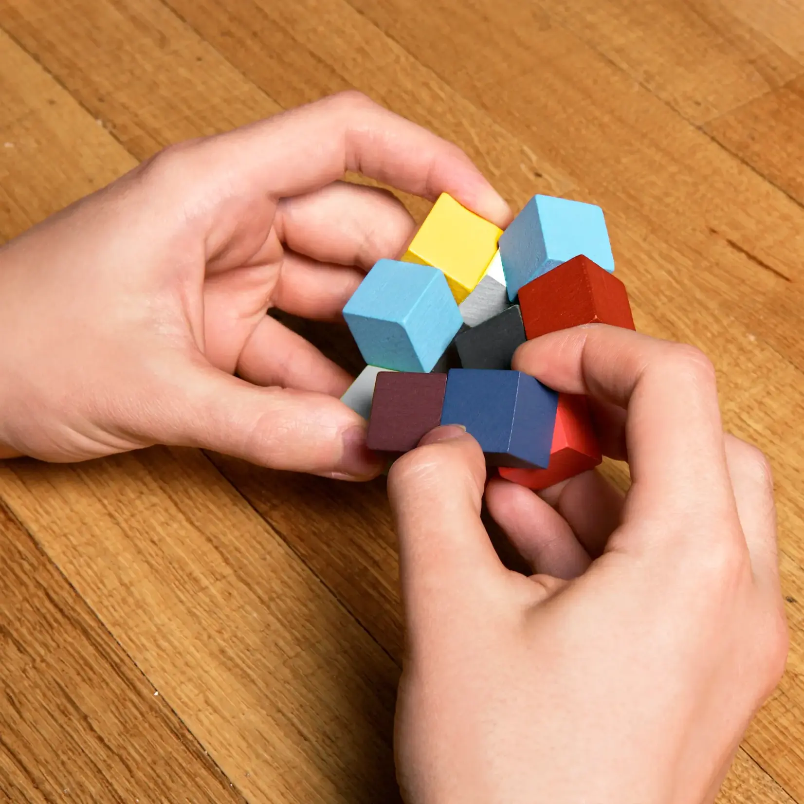 Kikkerland Elastic Cube 3D Wooden Puzzle