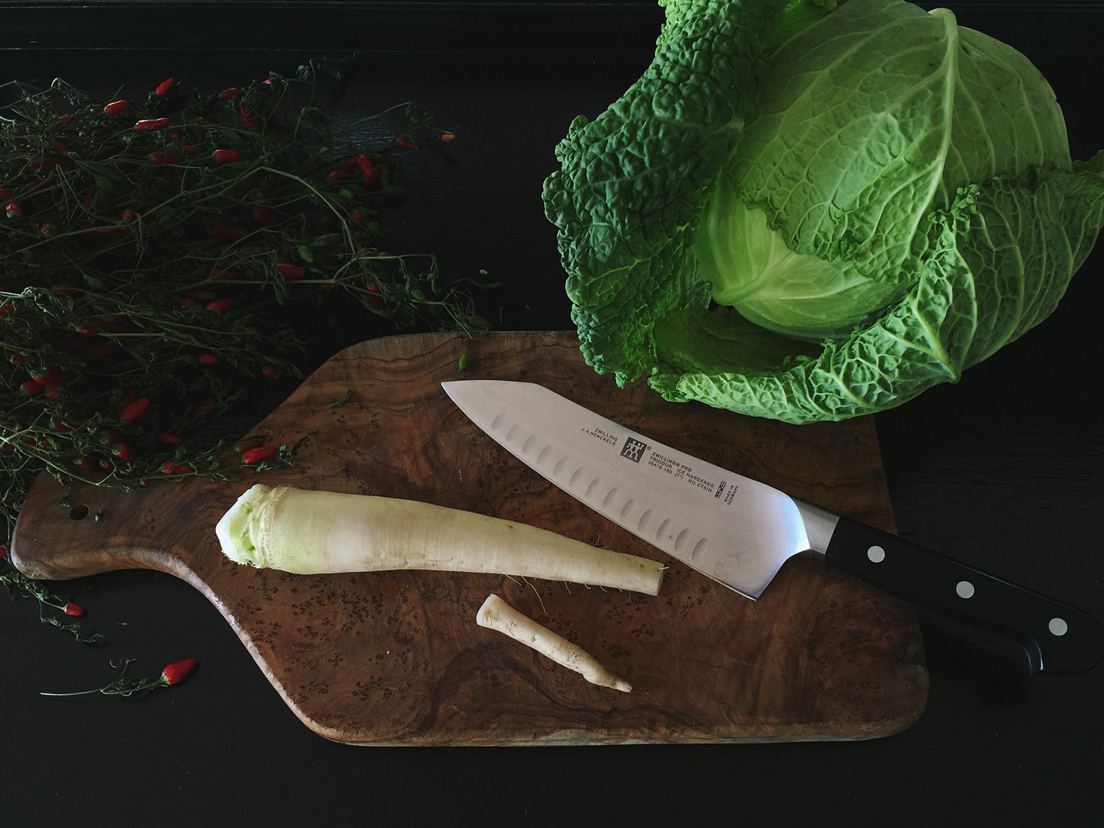 Zwilling ZWILLING Pro 7-inch Hollow Edge Rocking Santoku Knife