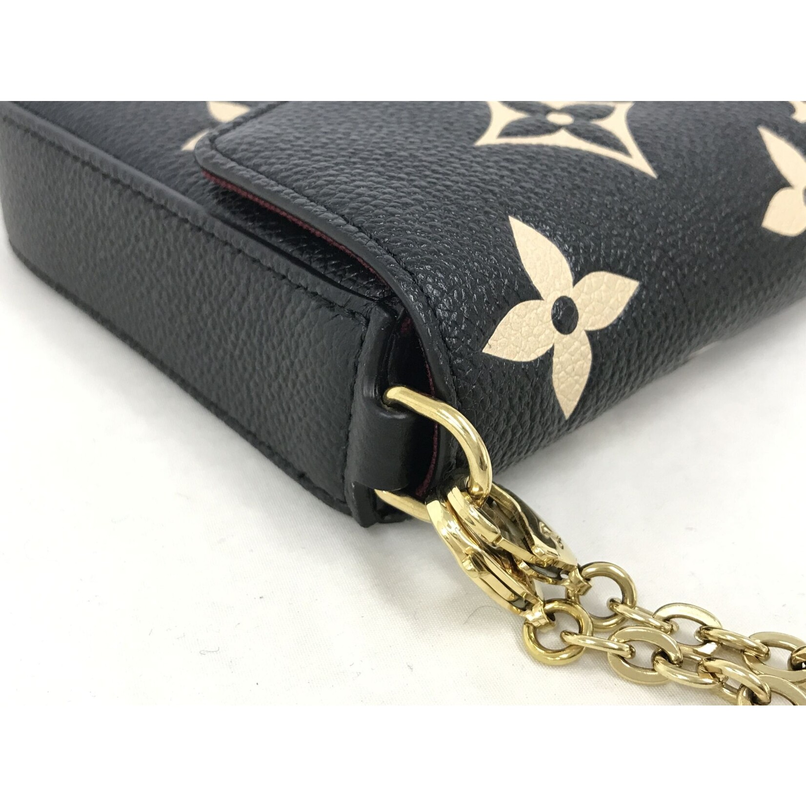 louis vuitton black handbag gold chain