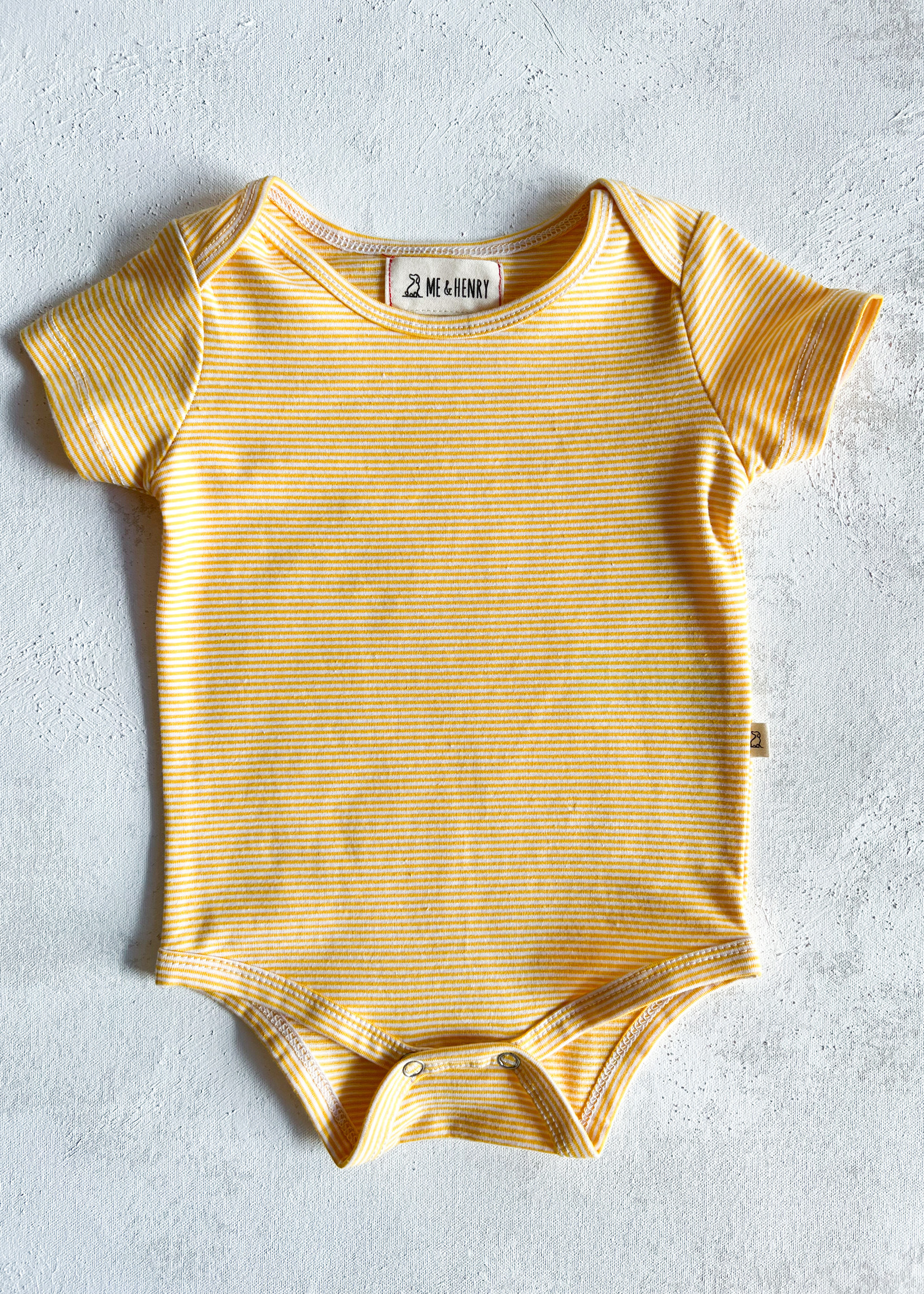 Elitaire Petite Walt Onesie in Yellow