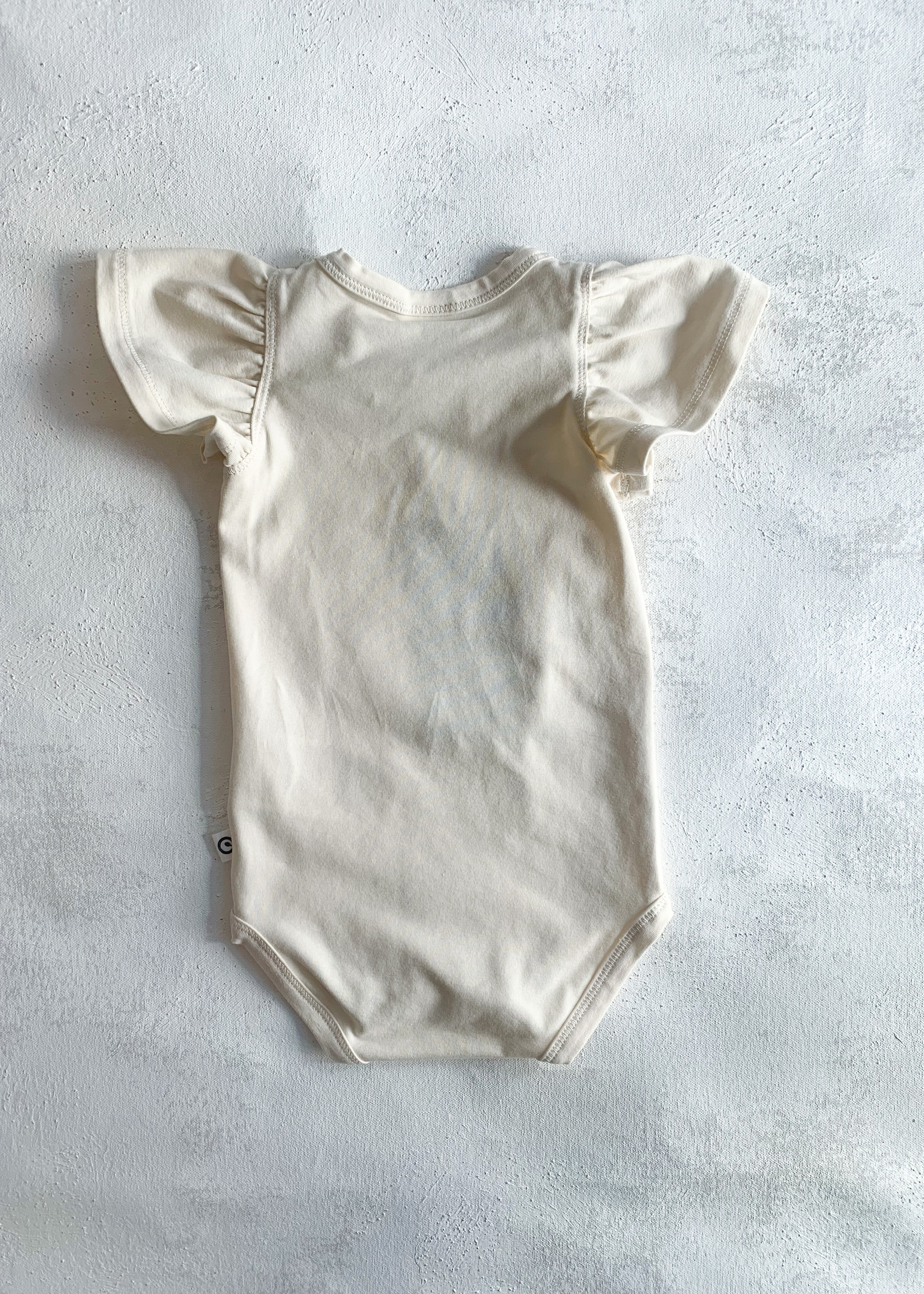 Elitaire Petite Cozy Me Frill Sleeve Onesie in Buttercream