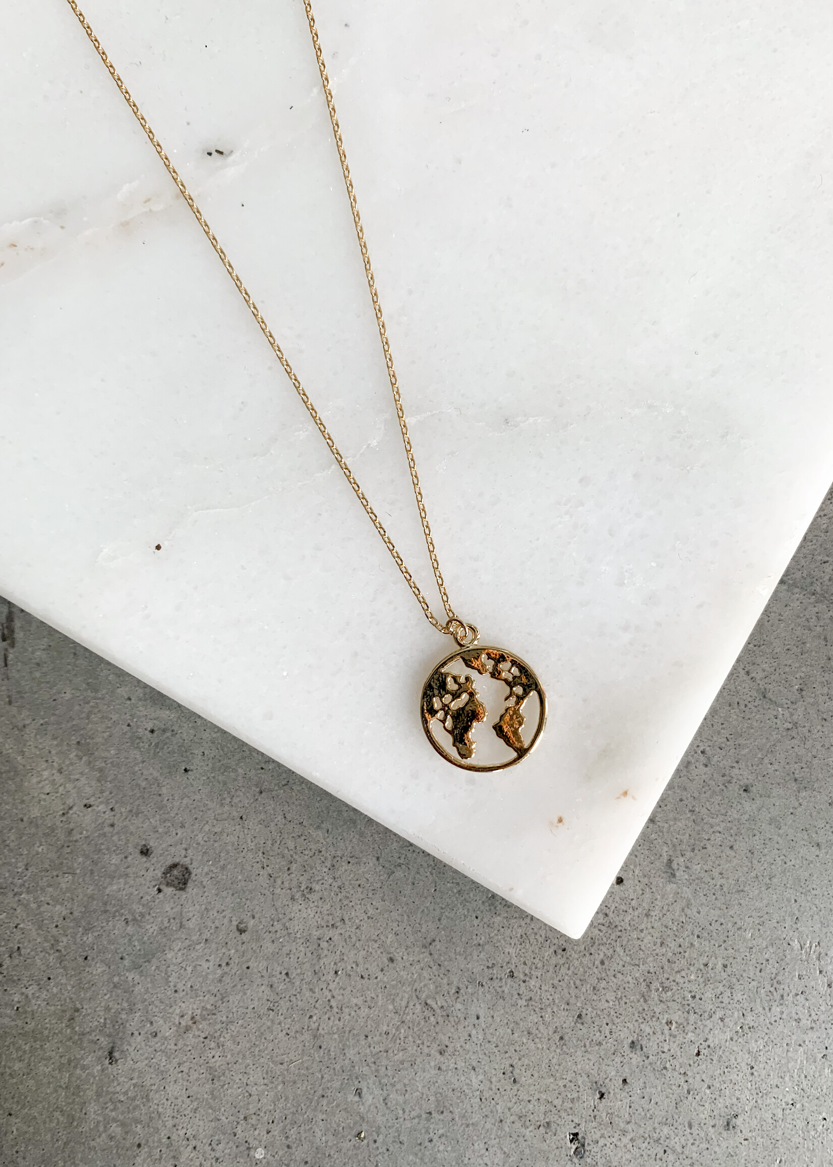 Elitaire Boutique World Map Necklace in Gold