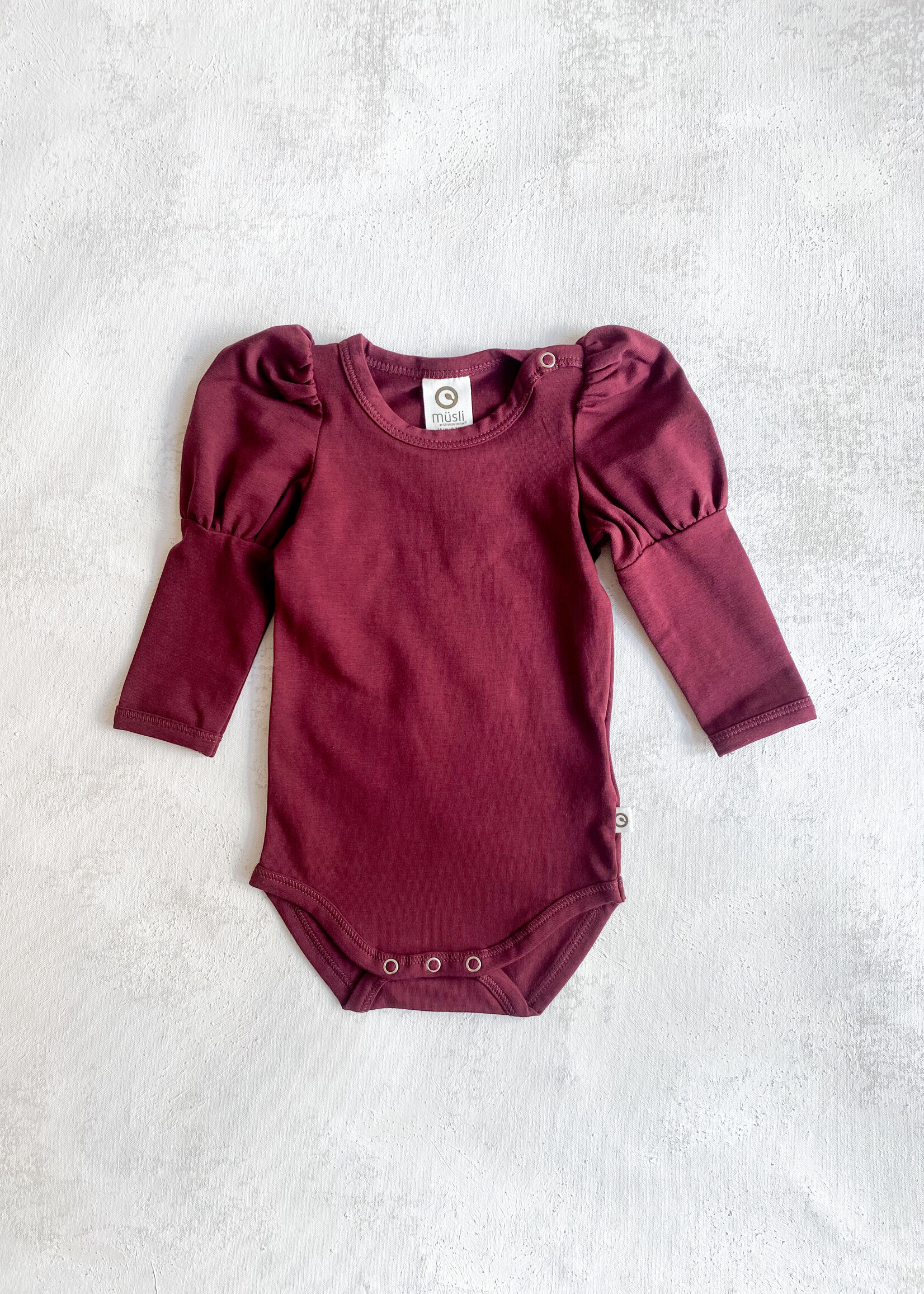 Elitaire Petite Fig Puff Sleeve Onesie