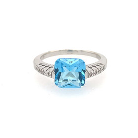 40539 14K. WHITE GOLD 2.64CT BLUE TOPAZ WITH .06CT DIAMOND SIDED RING