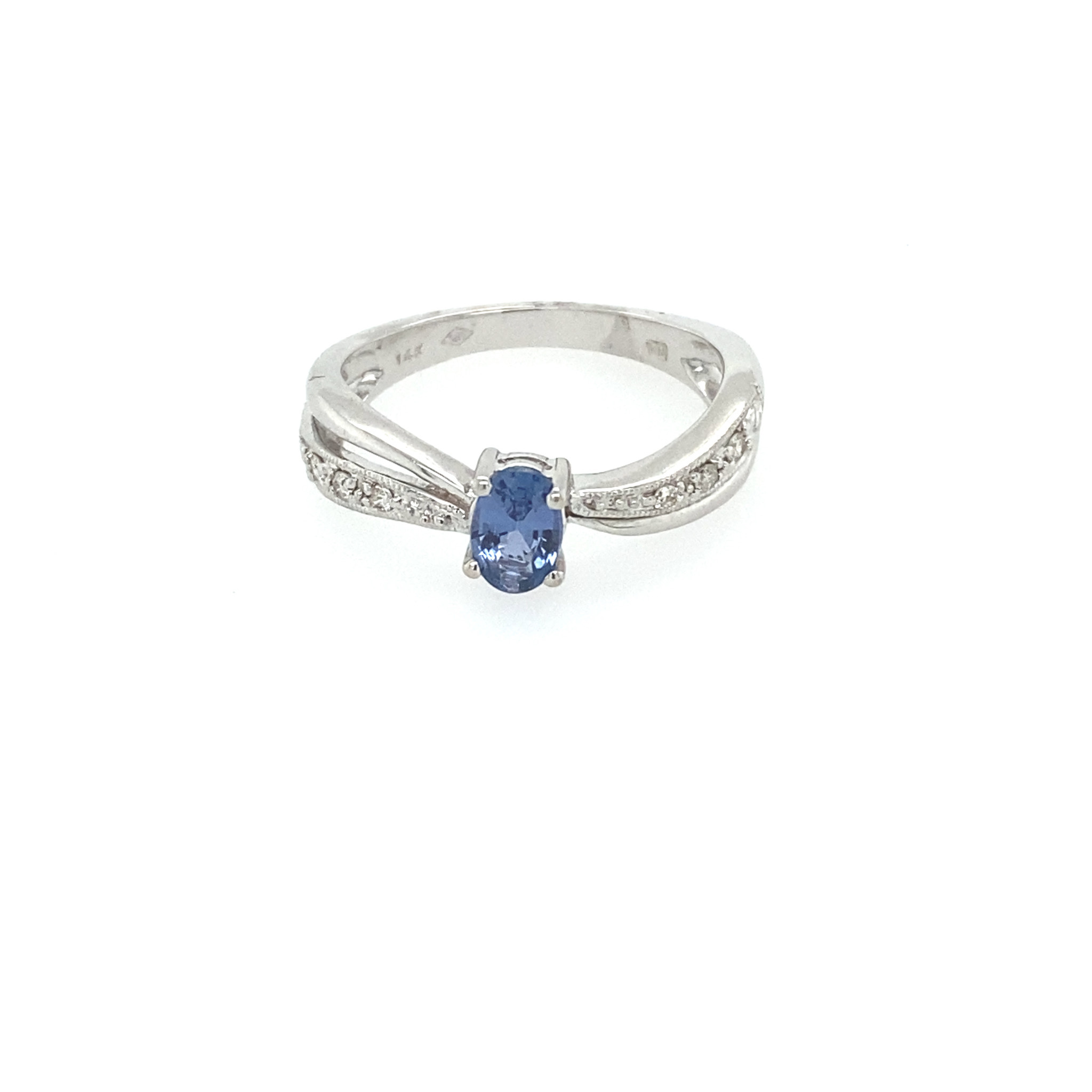 40298 14K. WHITE GOLD .57CT TANZANITE WITH .07CT DIAMOND RIBBON RING