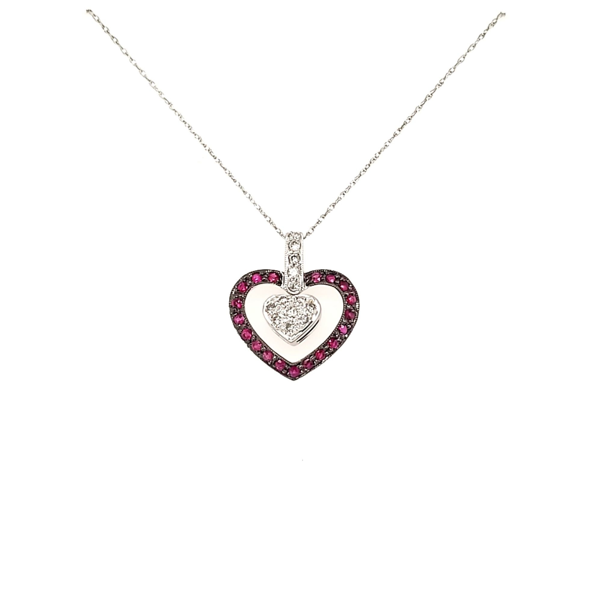 70084 18K WHITE GOLD DIAMOND AND RUBY OPEN HEART WITH FLOATING HEART PENDANT