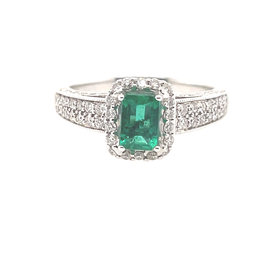 475504 18K WHITE GOLD .58CT EMERALD WITH .62CT DIAMOND HALO RING