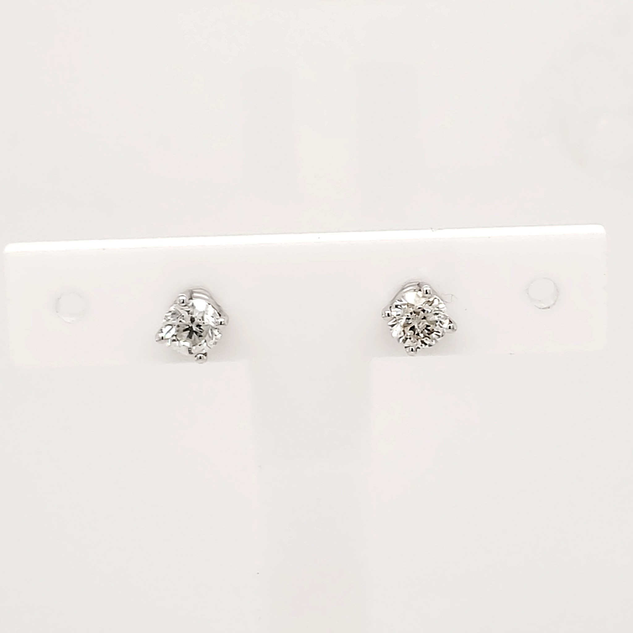 30063 .82CT ROUND DIAMOND SCREWBACKS SET IN 14K. WHITE GOLD