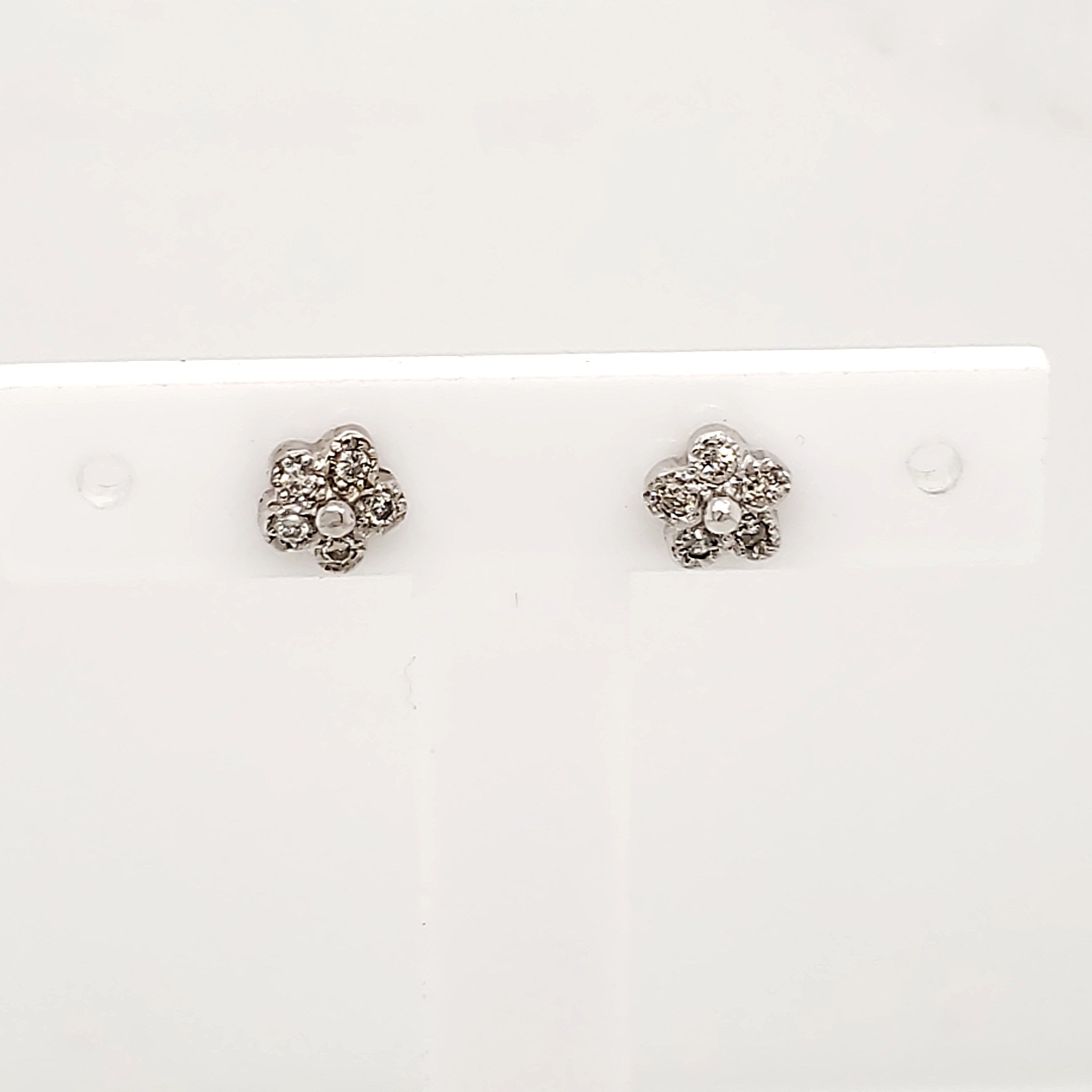 30292 14K. WHITE GOLD DIAMOND FLOWER STUDS