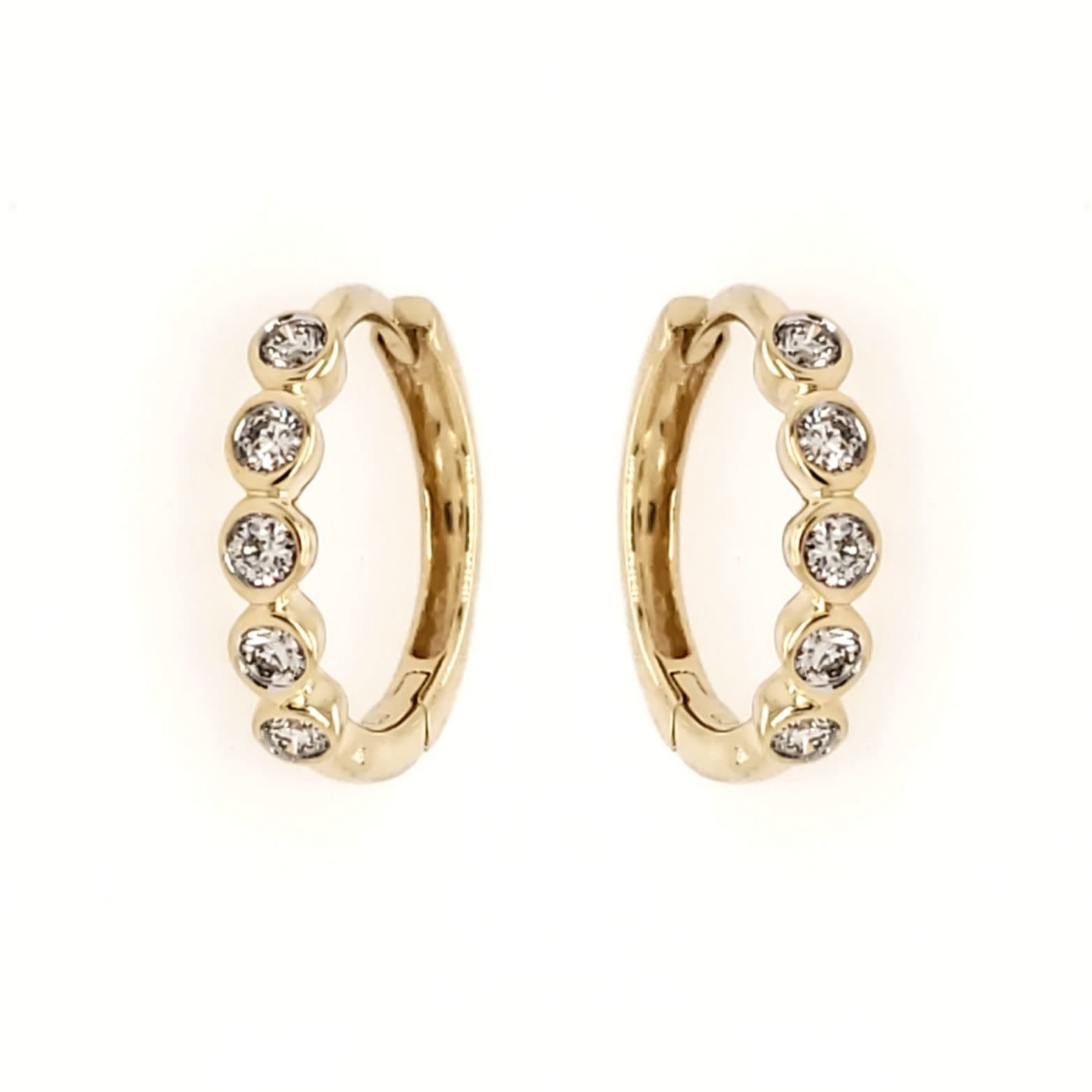 30353 14K YELLOW GOLD .20CT DIAMOND BEZEL SET SMALL HUGGIES