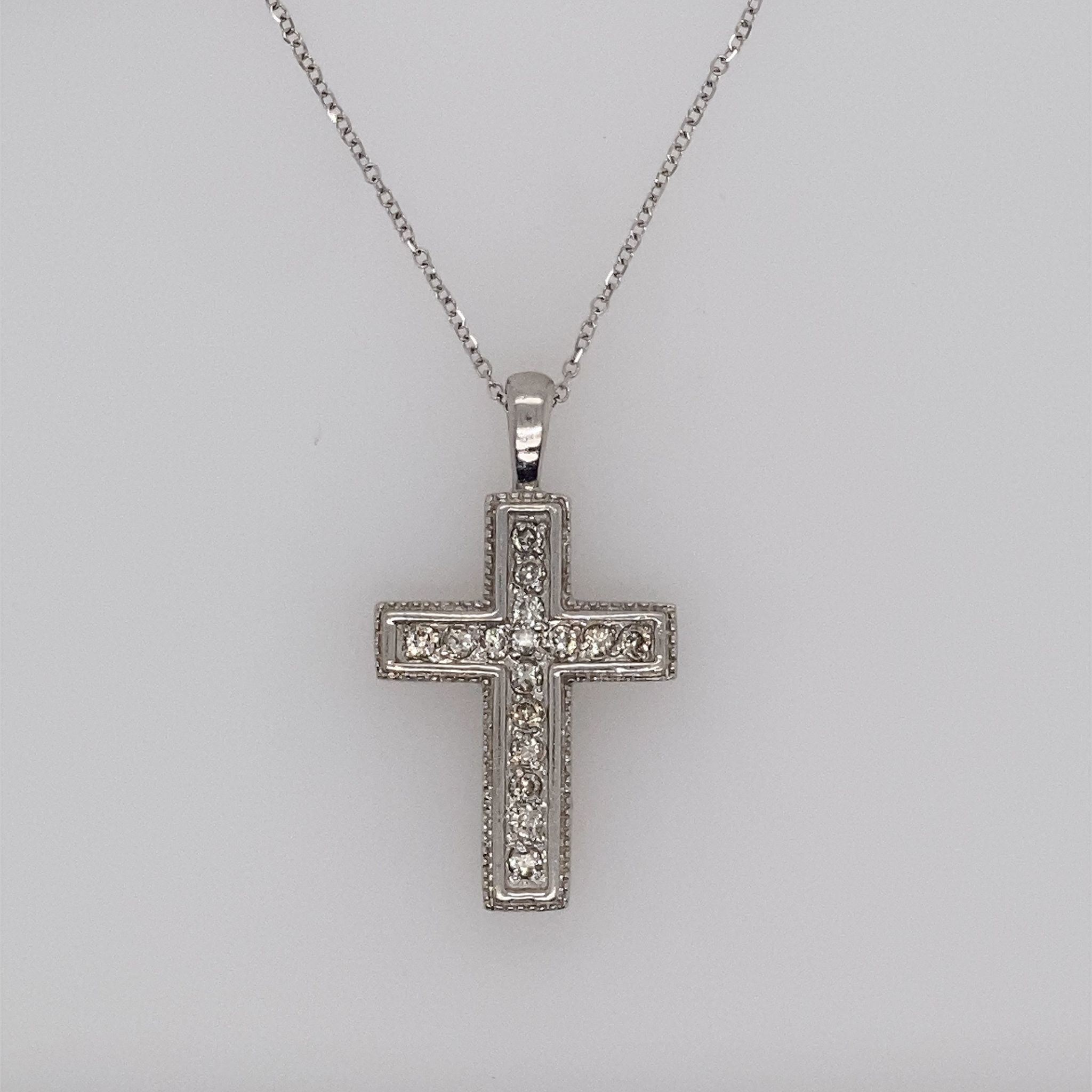 76069 14K WHITE GOLD .25CT DIAMOND MILIGRAIN CROSS PENDNAT
