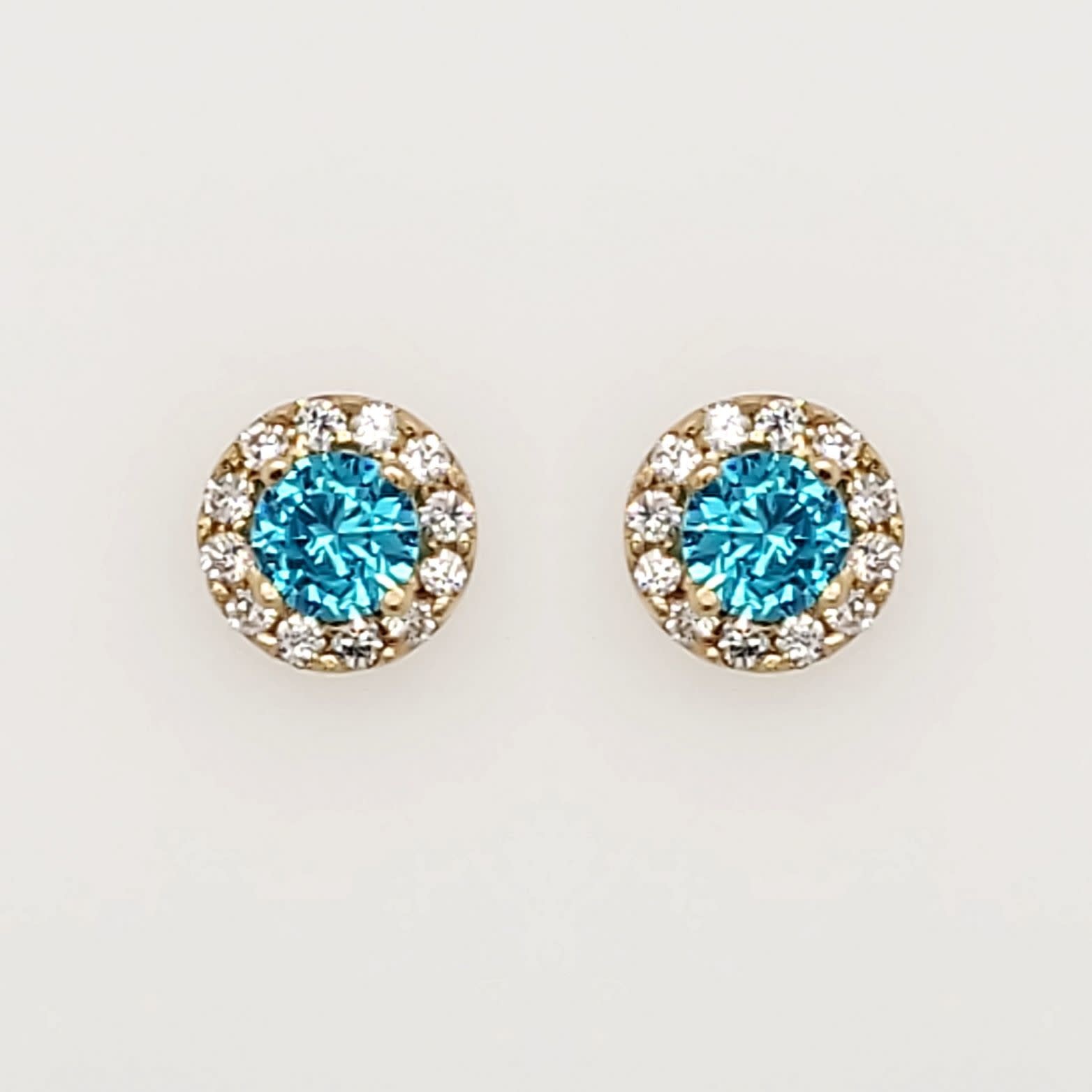 30377 14K YELLOW GOLD CUBIC ZIRCONIA HALO WITH BLUE TOPAZ CENTER SCREWBACKS