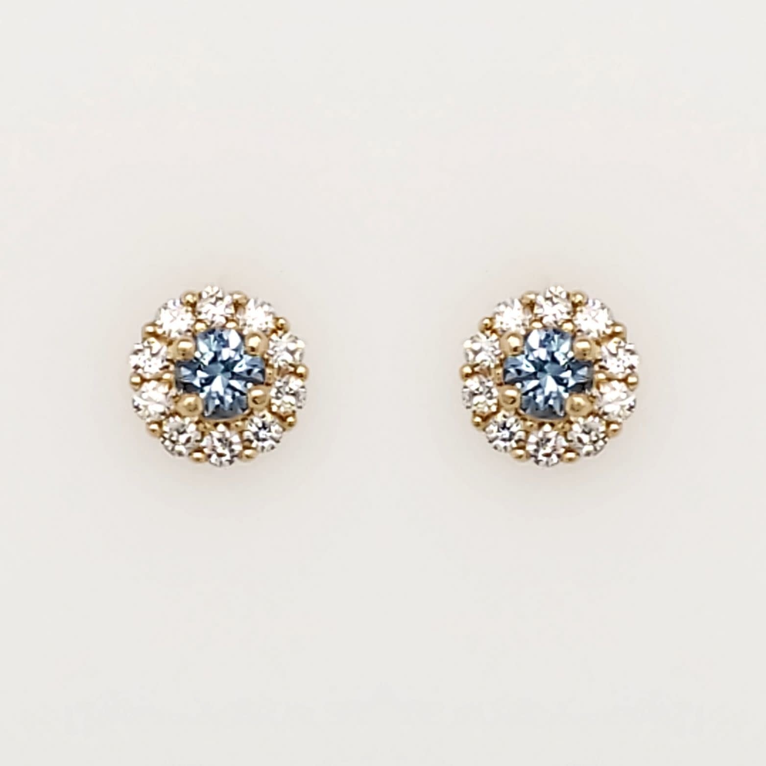 30376 14K YELLOW GOLD LIGHT BLUE CENTER WITH CUBIC ZIRCONIA HALO STUDS