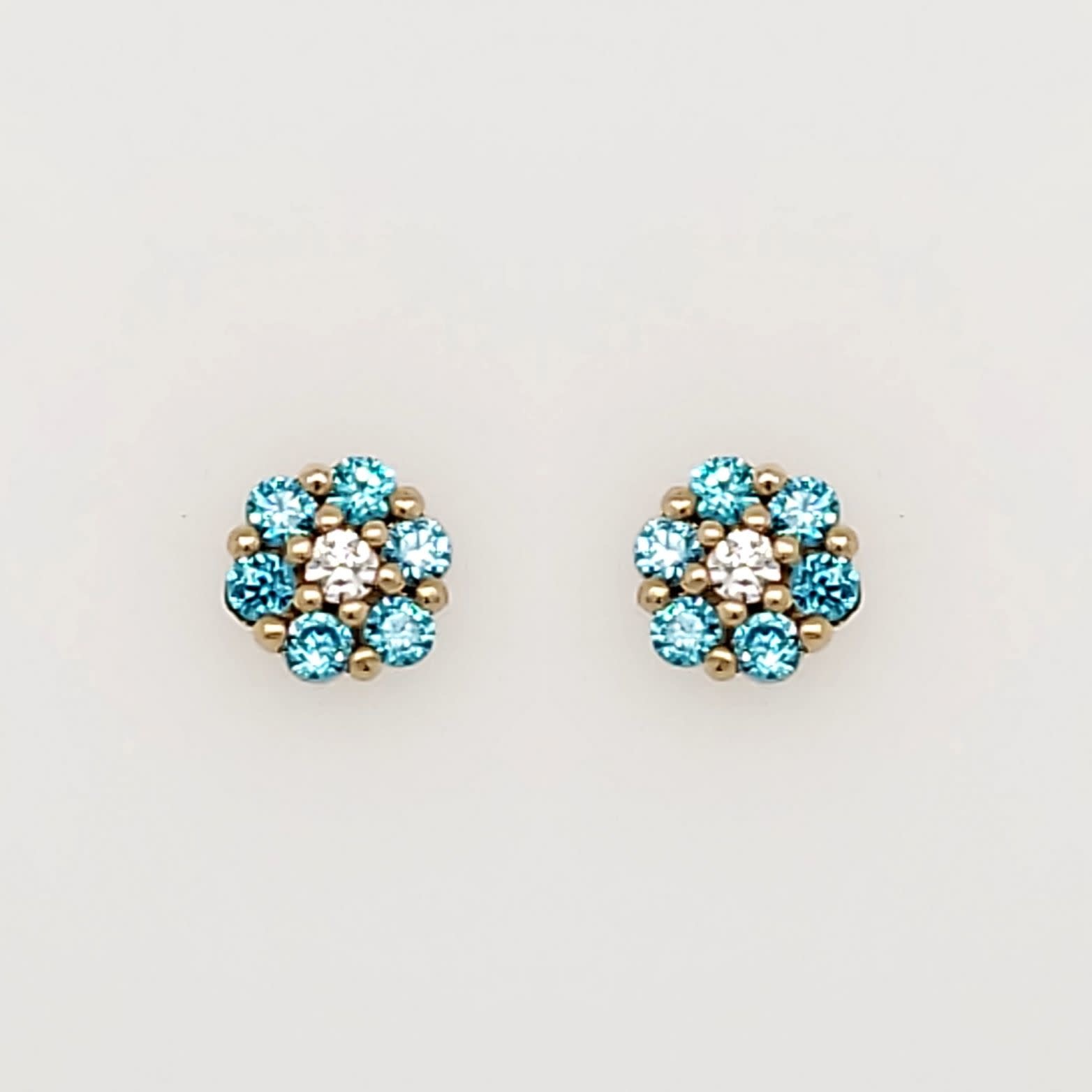 30371 14K YELLOW GOLD LIGHT BLUE CUBIC ZIRCONIA CLUSTER FLOWER SCREWBACKS