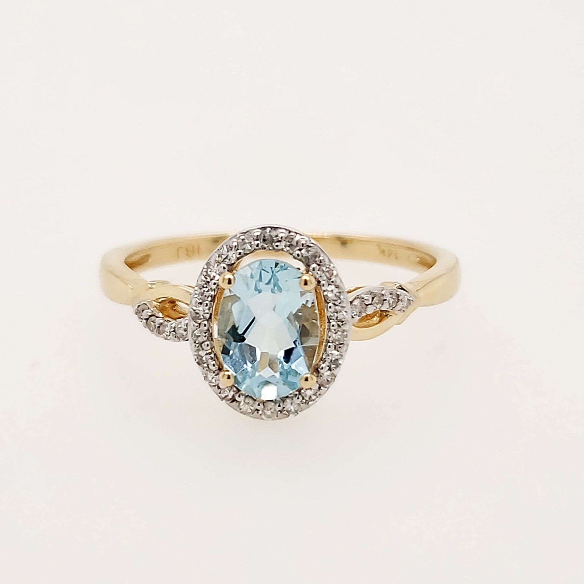 40056 14K YELLOW GOLD .15CTW HALO DIAMOND OVAL AQUAMARINE RING