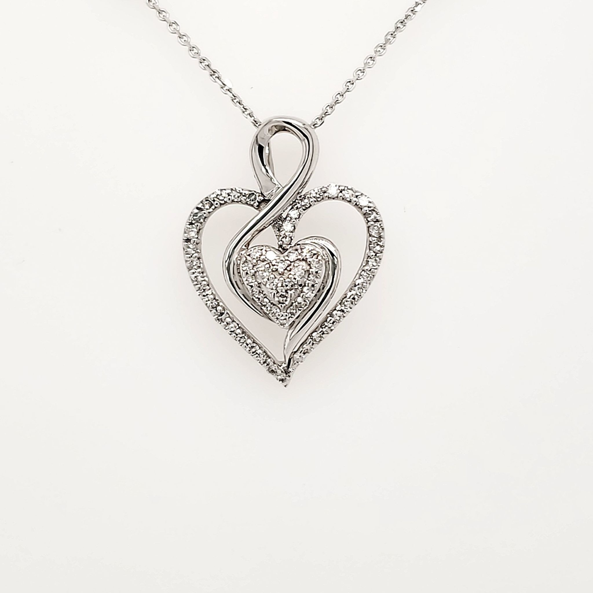 70032 14K WHITE GOLD .25CT DIAMOND OPEN HEART WITH SMALL PAVE HEART PENDANT SET