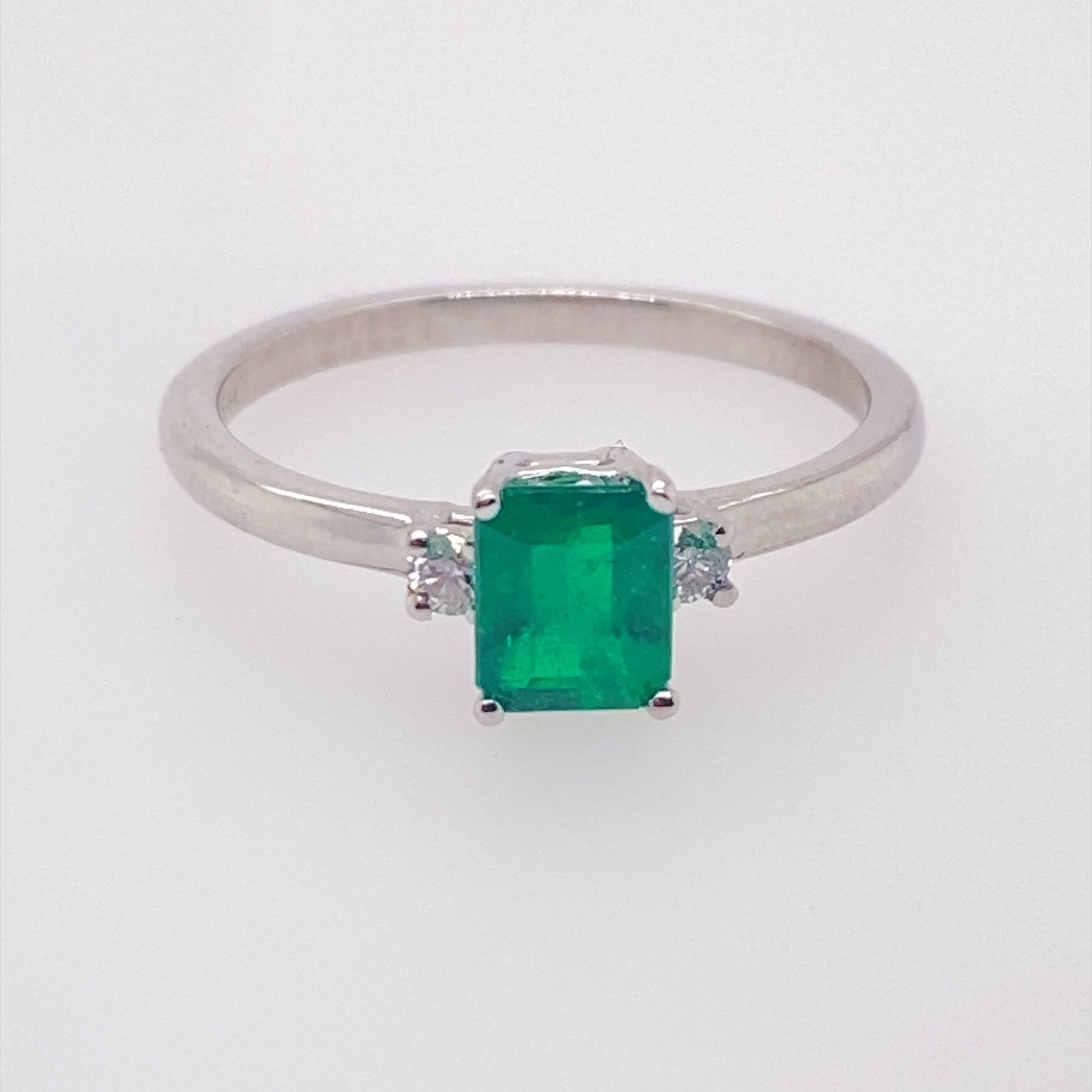 40060 14K WHITE GOLD .10CTW DIAMOND .71CT EMERALD CUT RING