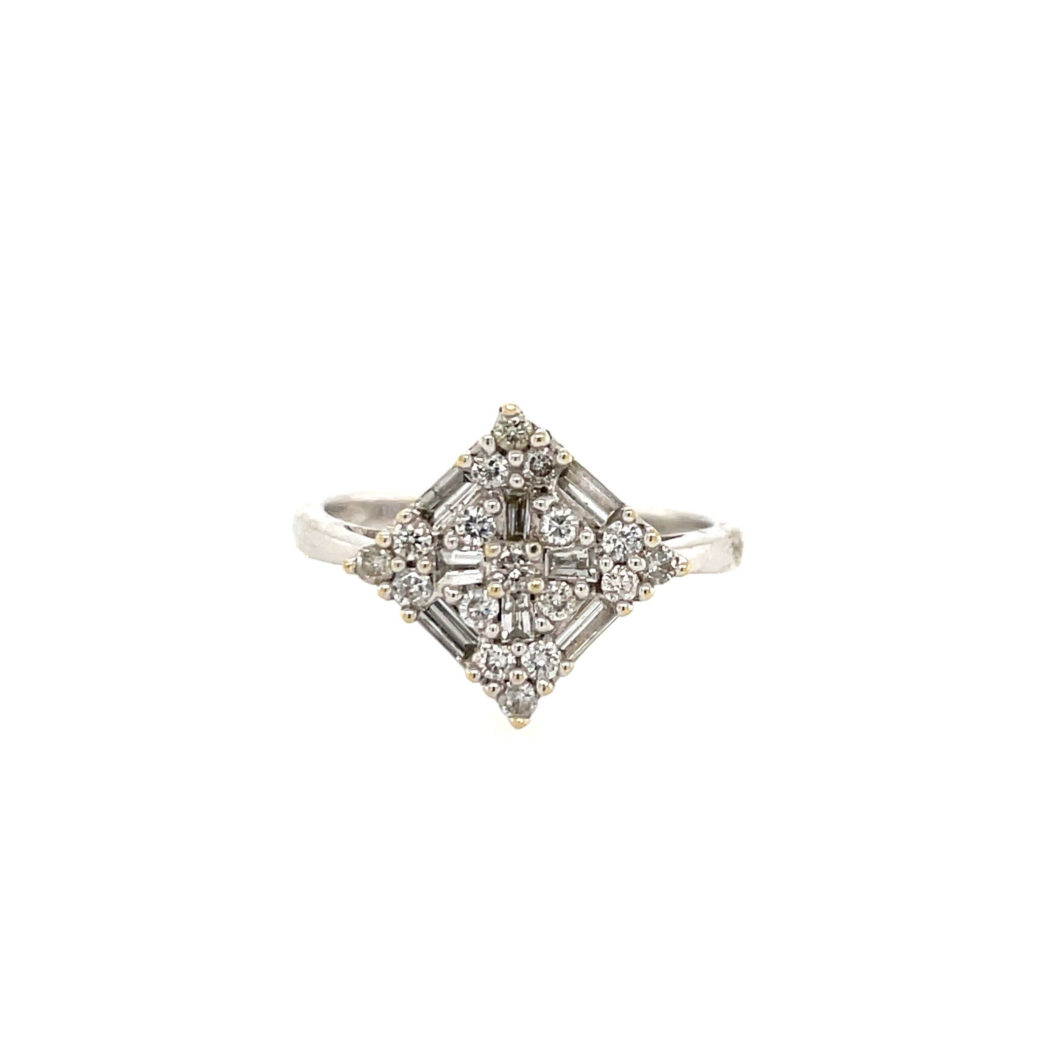 40739 18K WHITE GOLD .50TCW BAGUETTE AND ROUND DIAMOND RING