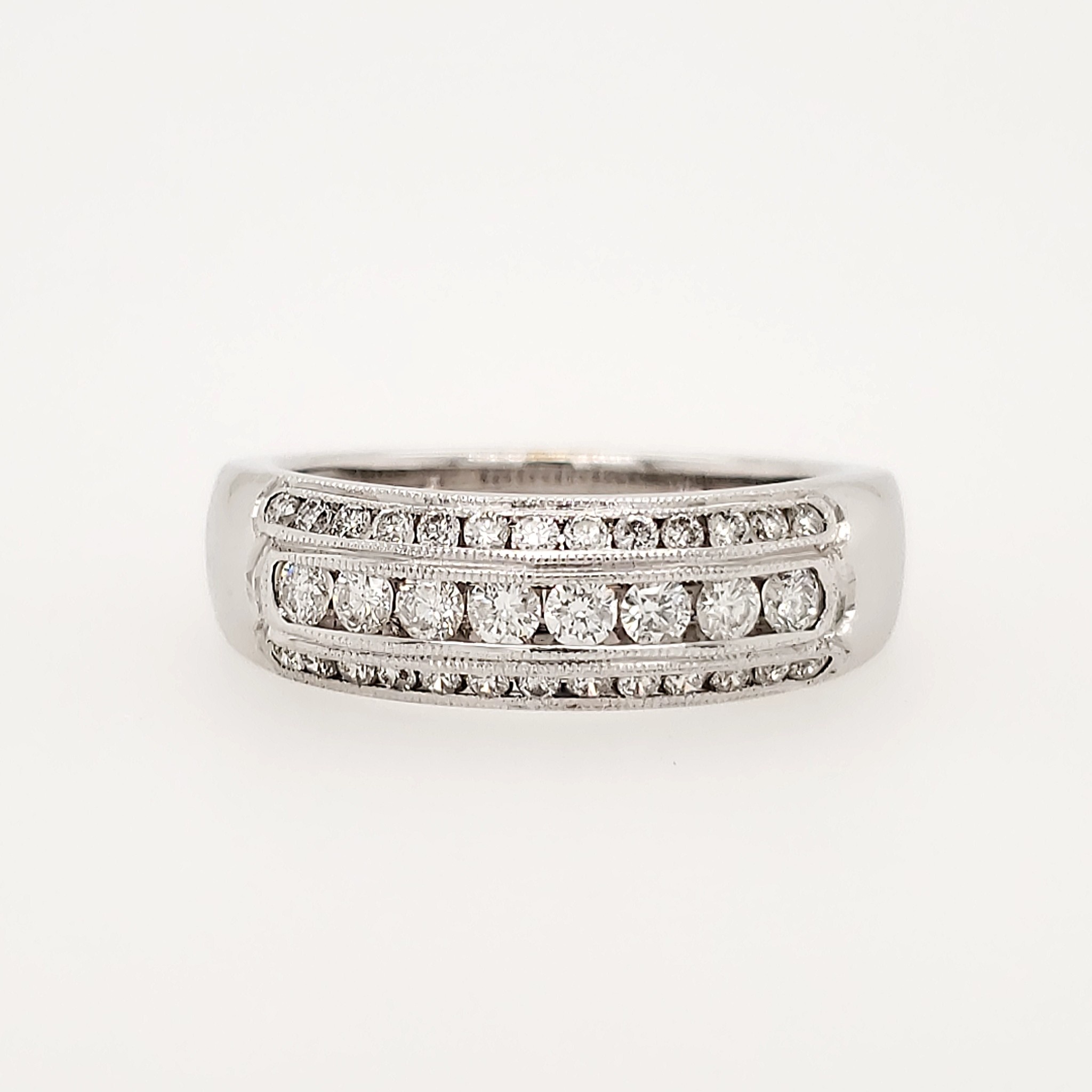 475495 14K WHITE GOLD .49CT CHANNEL SET DIAMONDS WITH MILIGRAIN EDGES