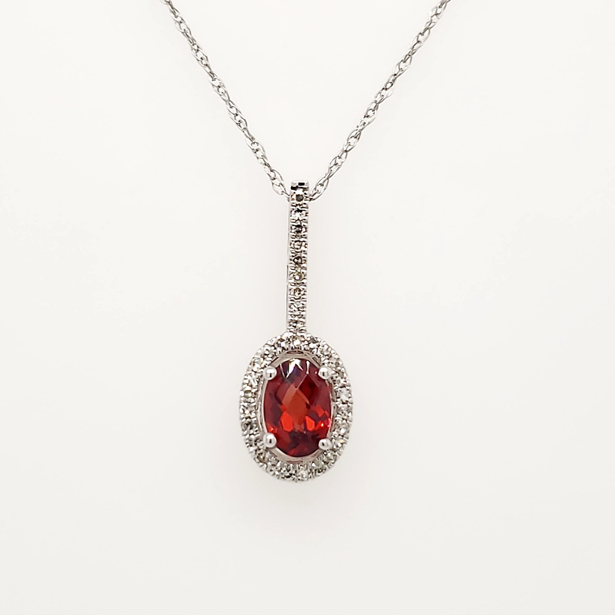 70143 14K WHITE GOLD .10CTW DIAMOND HALO AND BAIL OVAL GARNET PENDANT NECKLACE