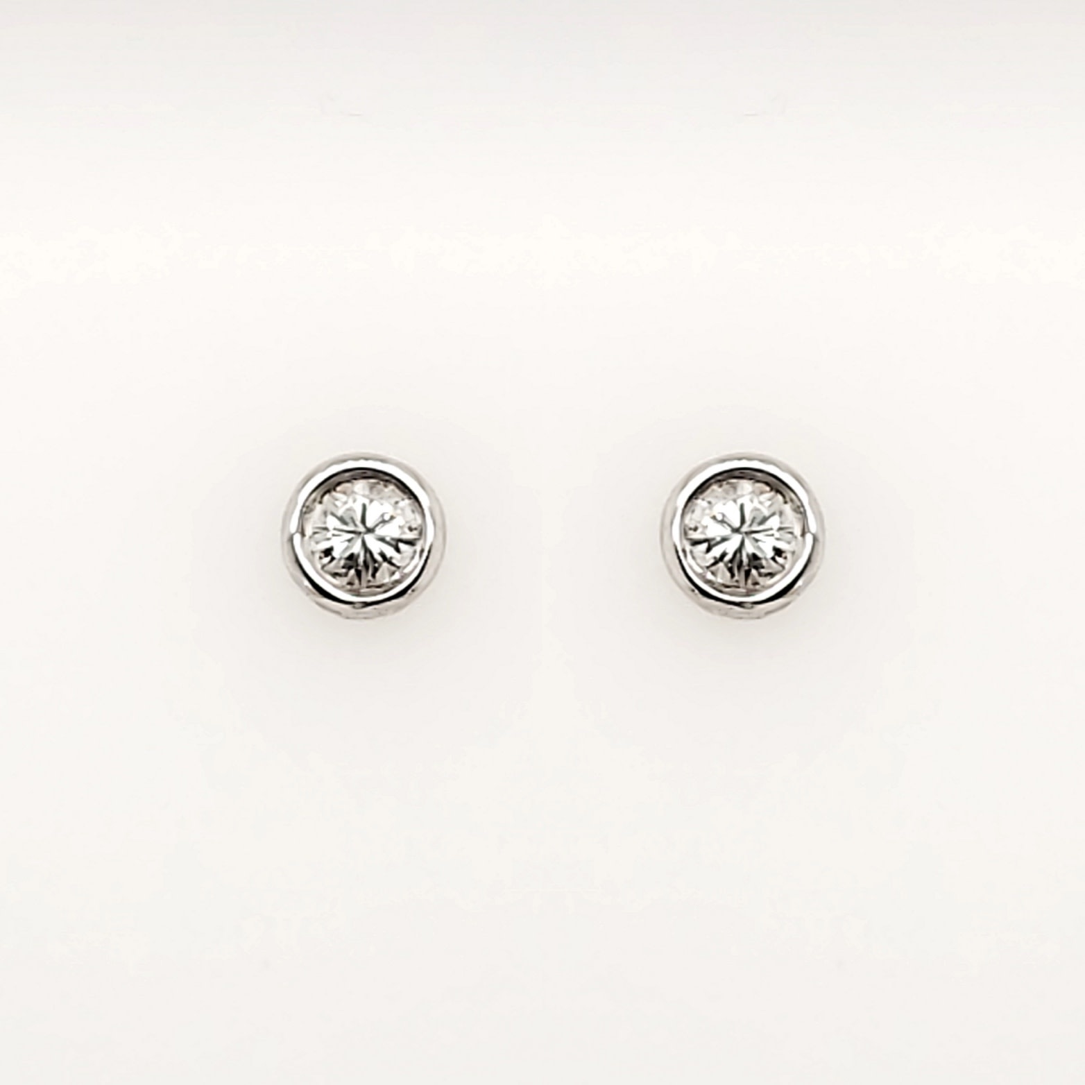 30527 14K WHITE GOLD .15CTW DIAMOND BEZEL SET STUD PUSH BACKS