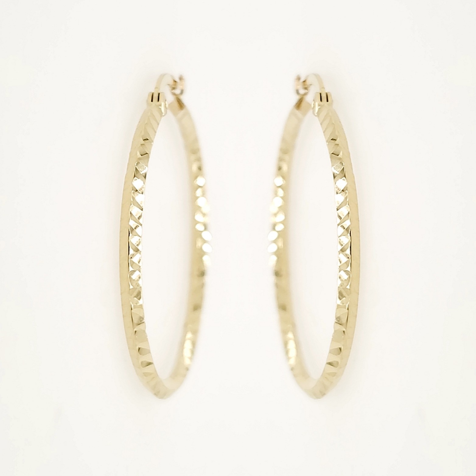 30549 14K YELLOW GOLD 1.25" 3MM HAMMERED DESIGN HOOPS